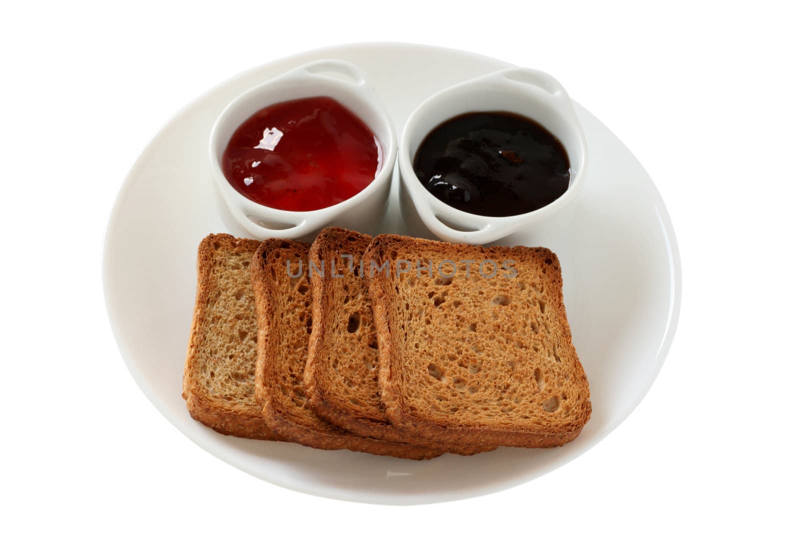 toasts with jam in bowls by nataliamylova