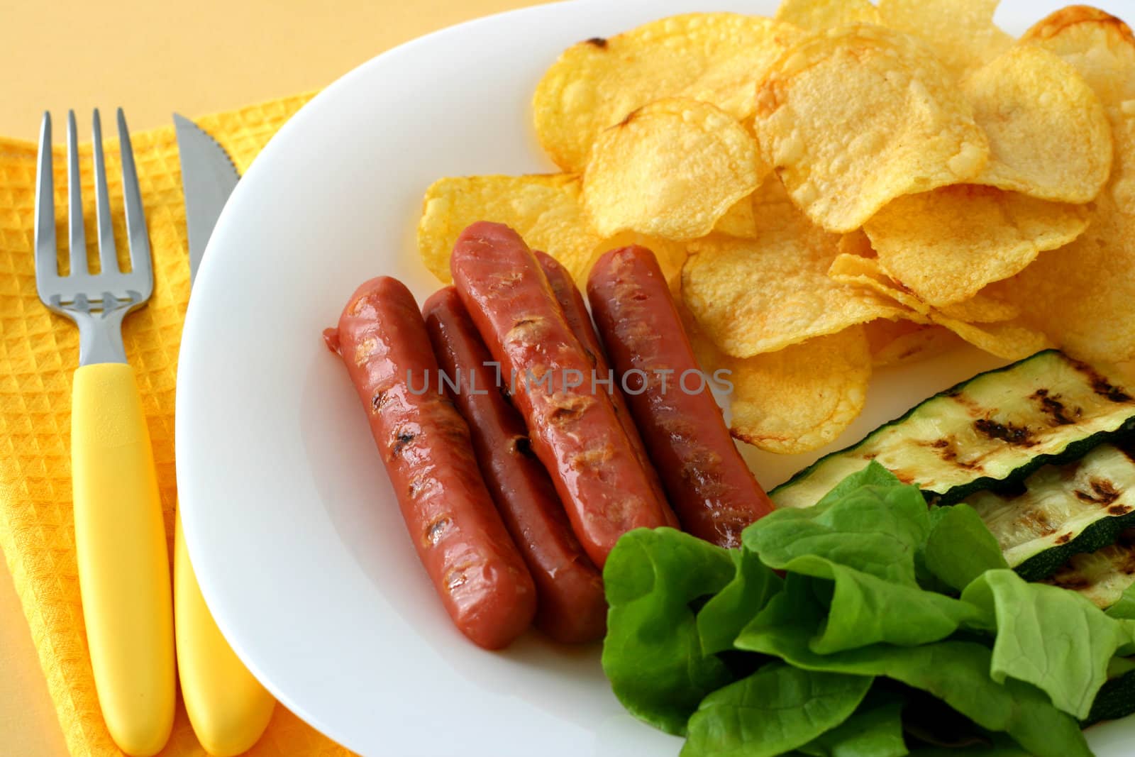 Grilled sausages with chips by nataliamylova