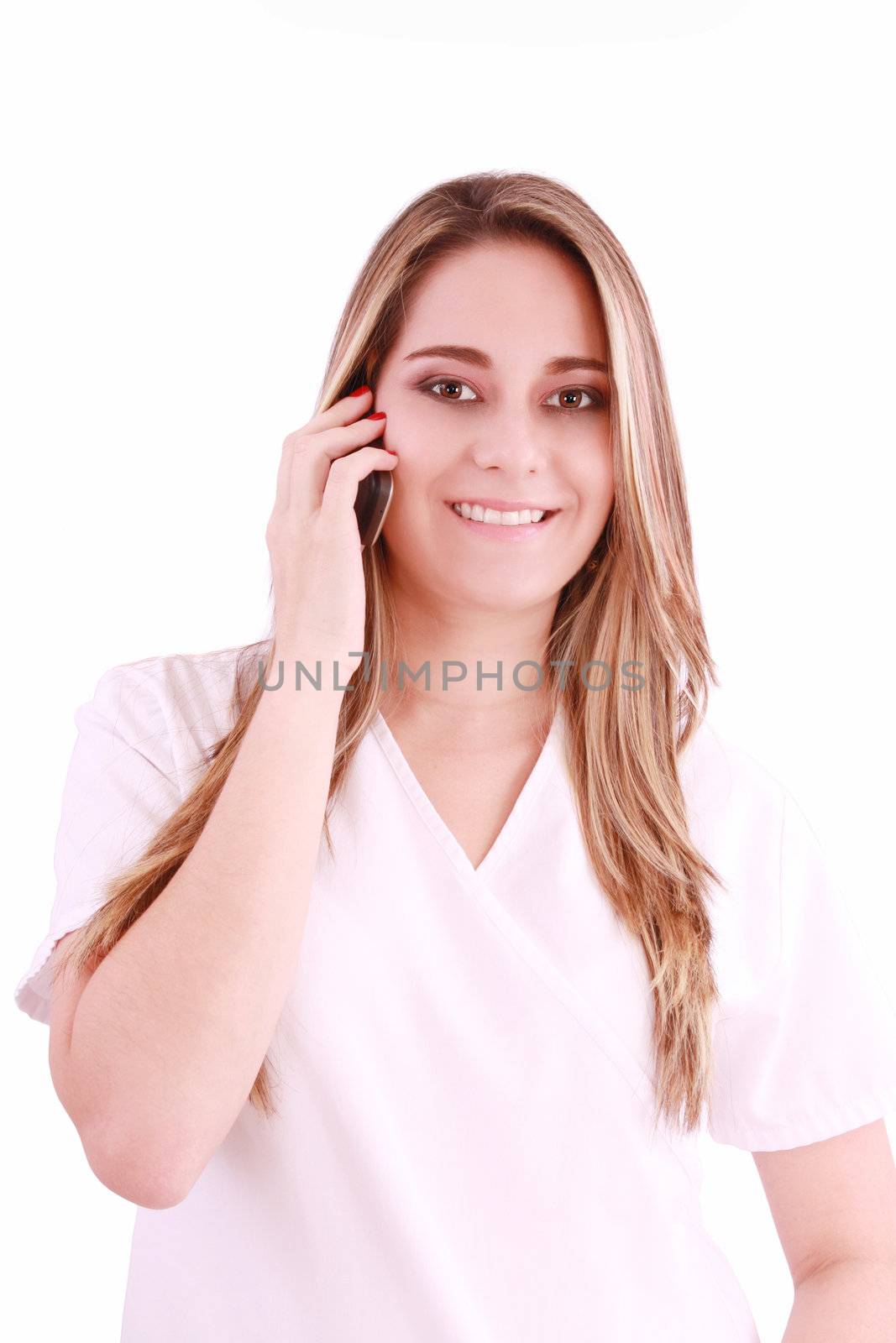 Young beautiful woman-nurse talks by mobile phone, isolated on white background.