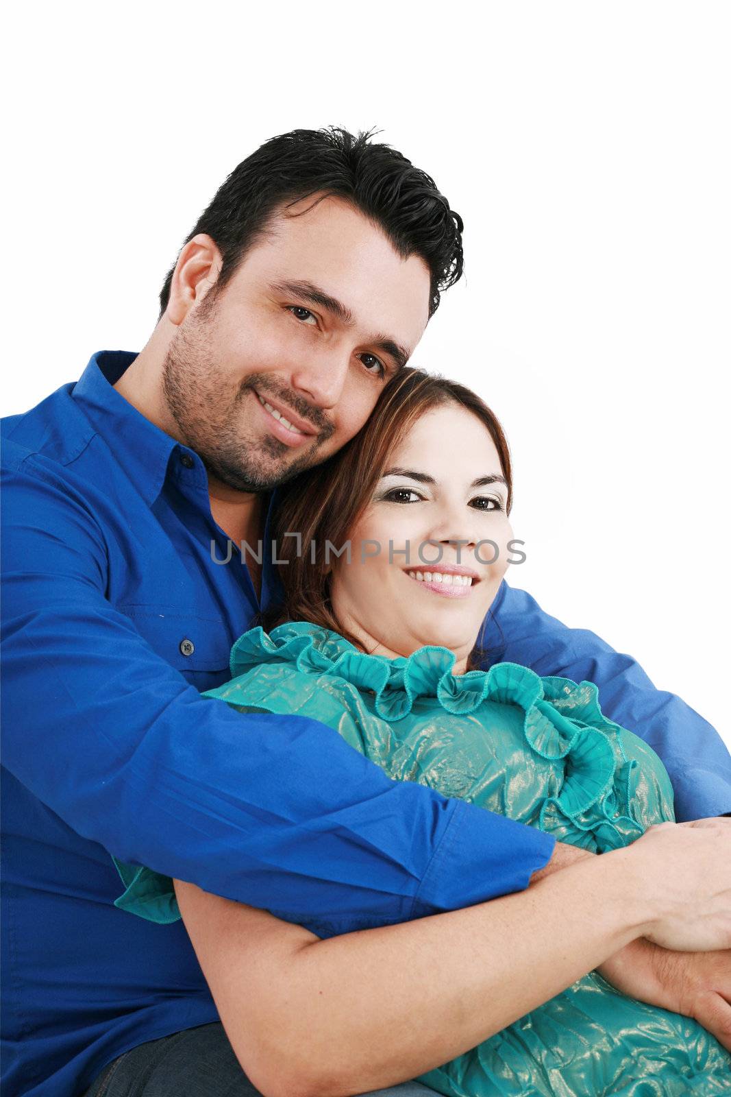 Young love couple smiling. Over white background