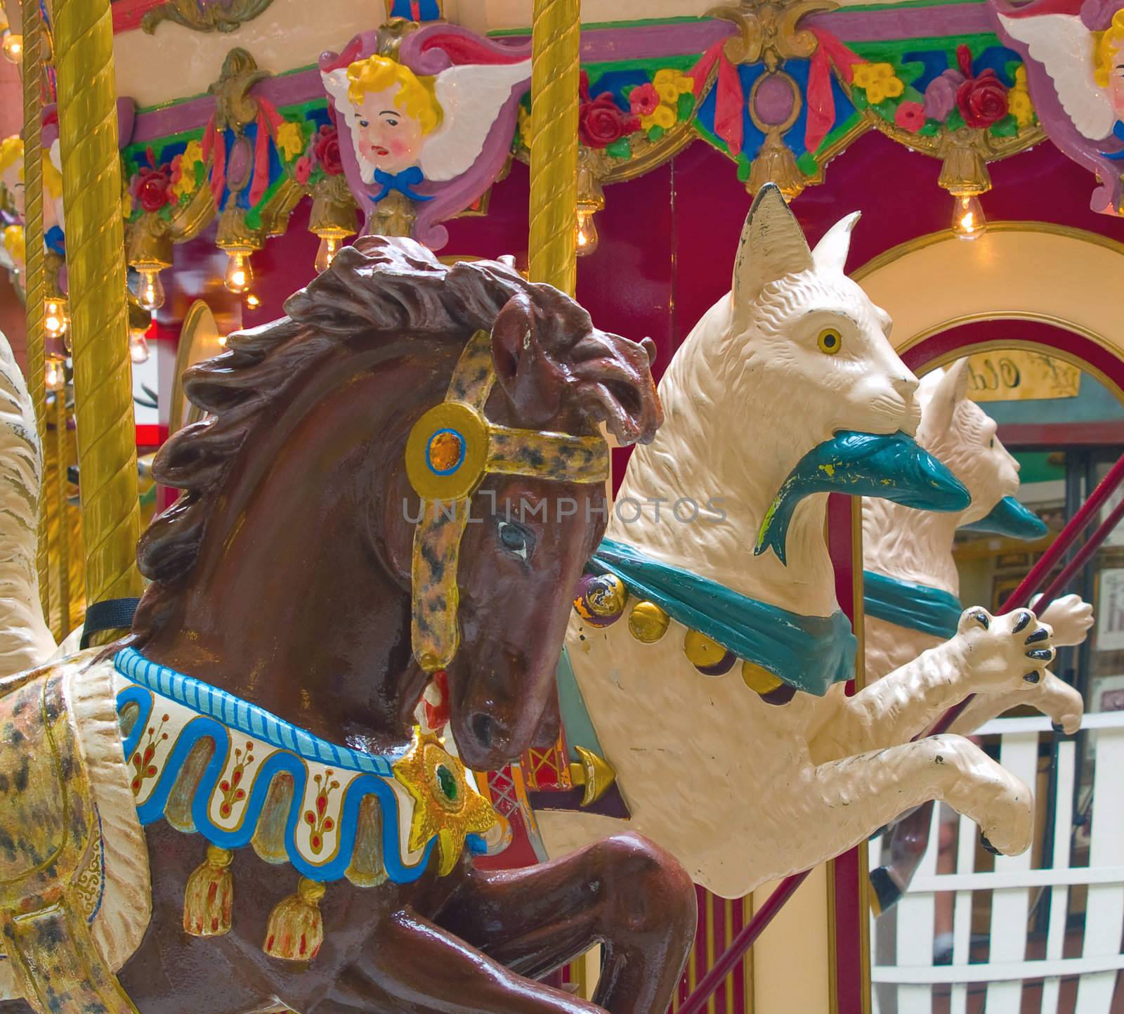 Carousel animals on an indoor amusement ride