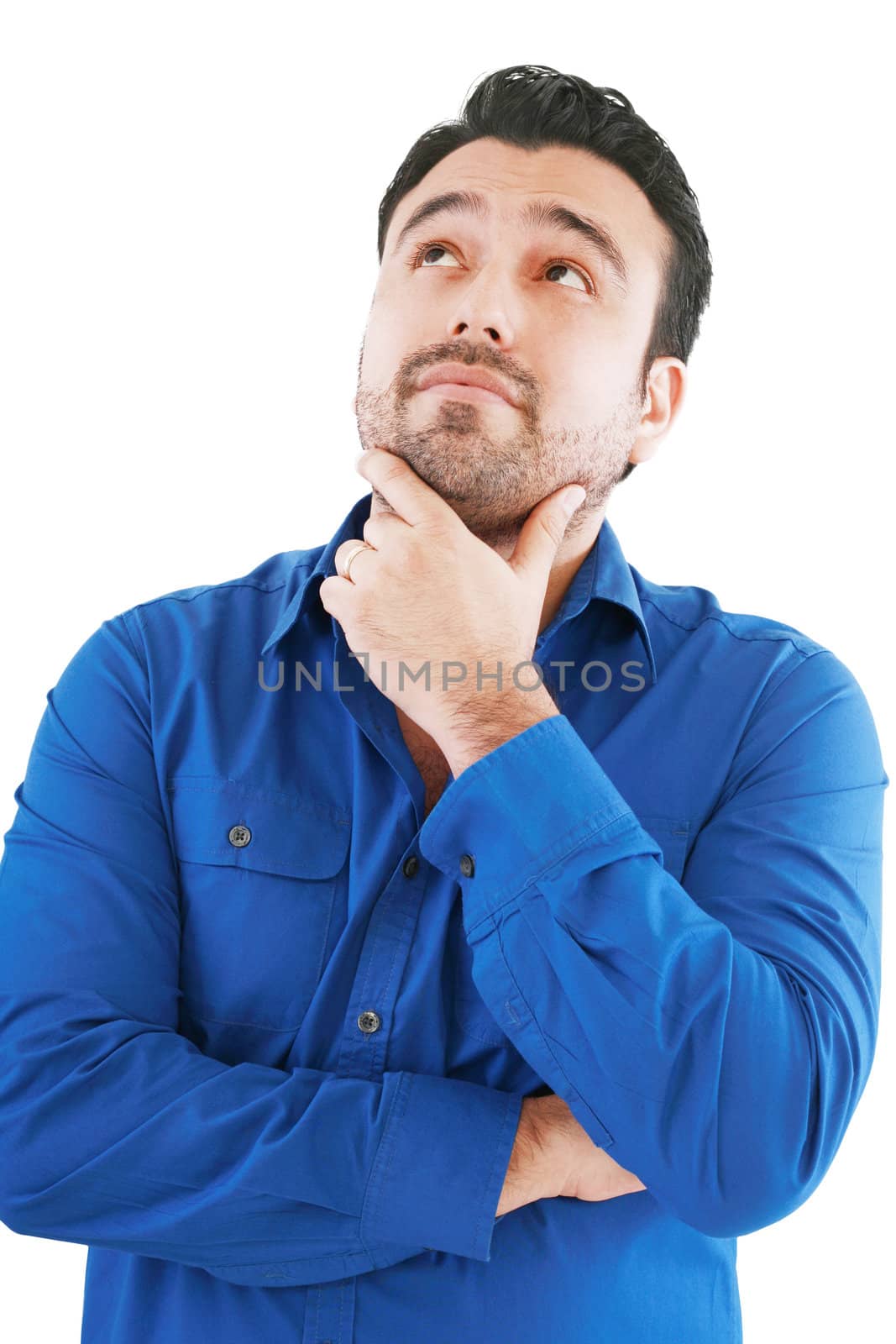 Young man in thoughtful pose. Isolated over white. by dacasdo