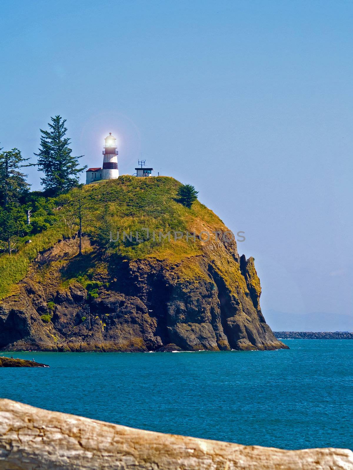 Lighthouse at Cape Disappointment at Fort Canby State Park in WA USA with Light