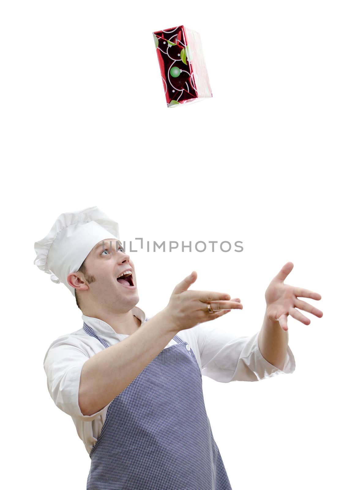 chief cook tossing a gift, isolated on white