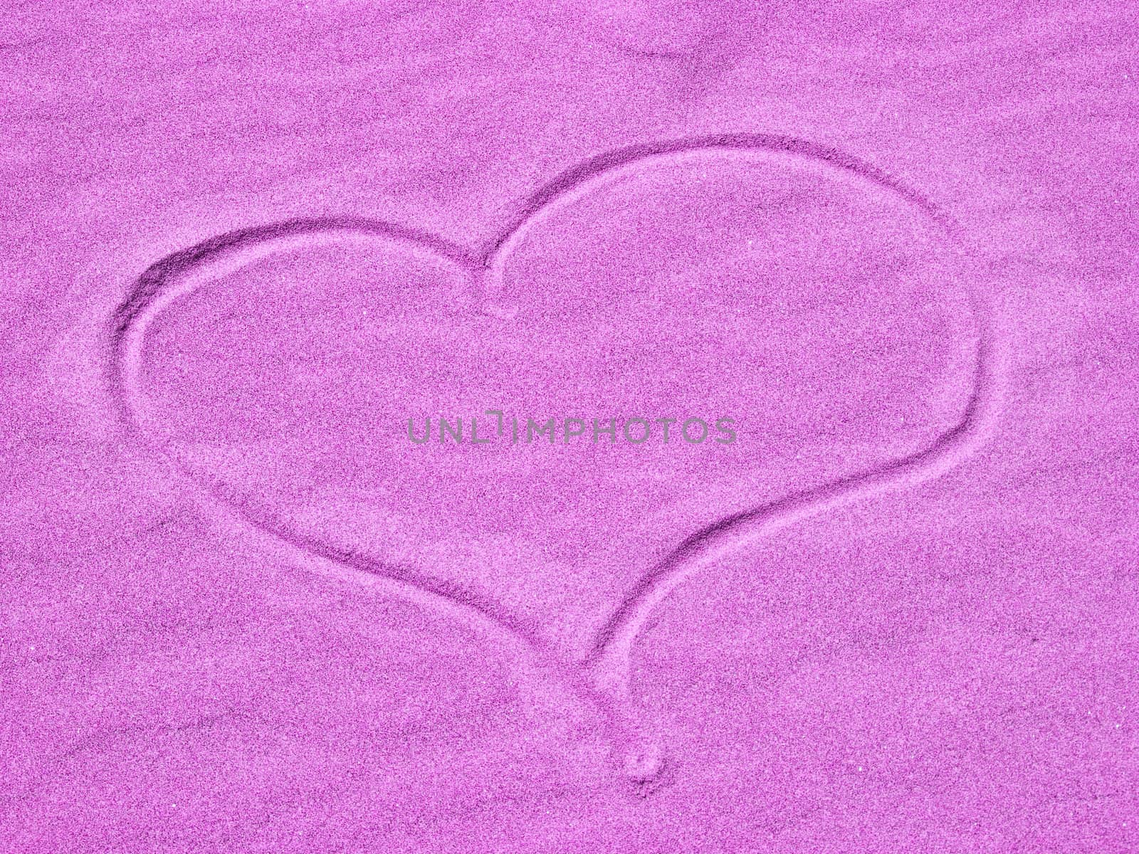 Purple Heart in the Sand on a Sunny Day