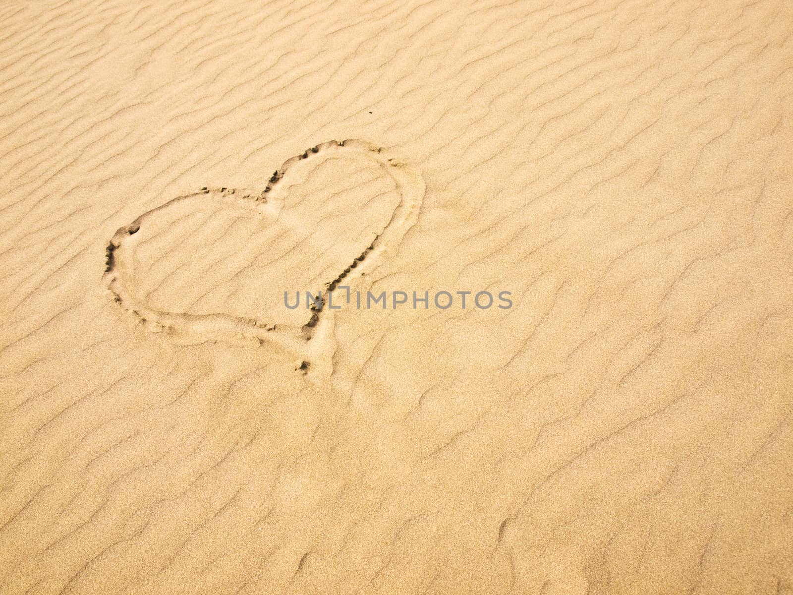 Heart in the Sand on a Sunny Day by Frankljunior