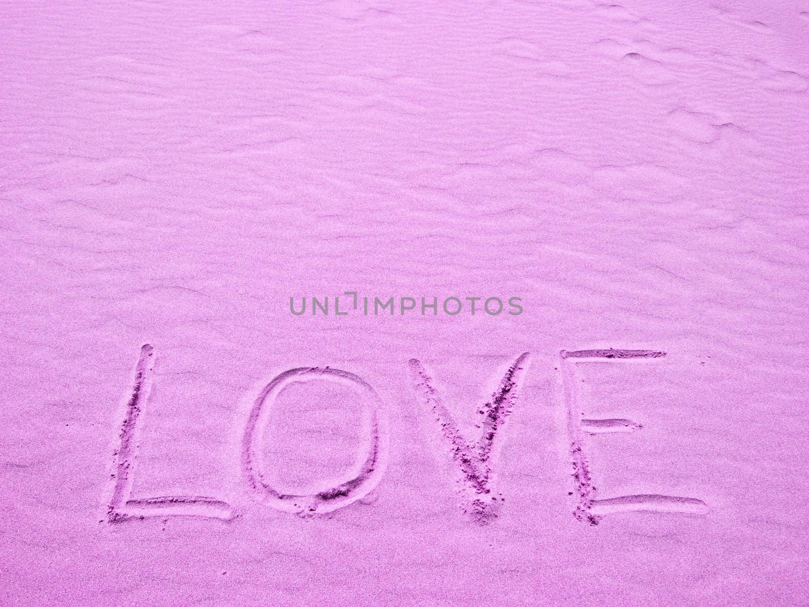 Love Written in Pink Sand on a Sunny Day