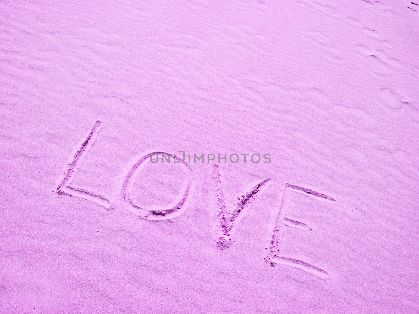 Love Written in Pink Sand on a Sunny Day