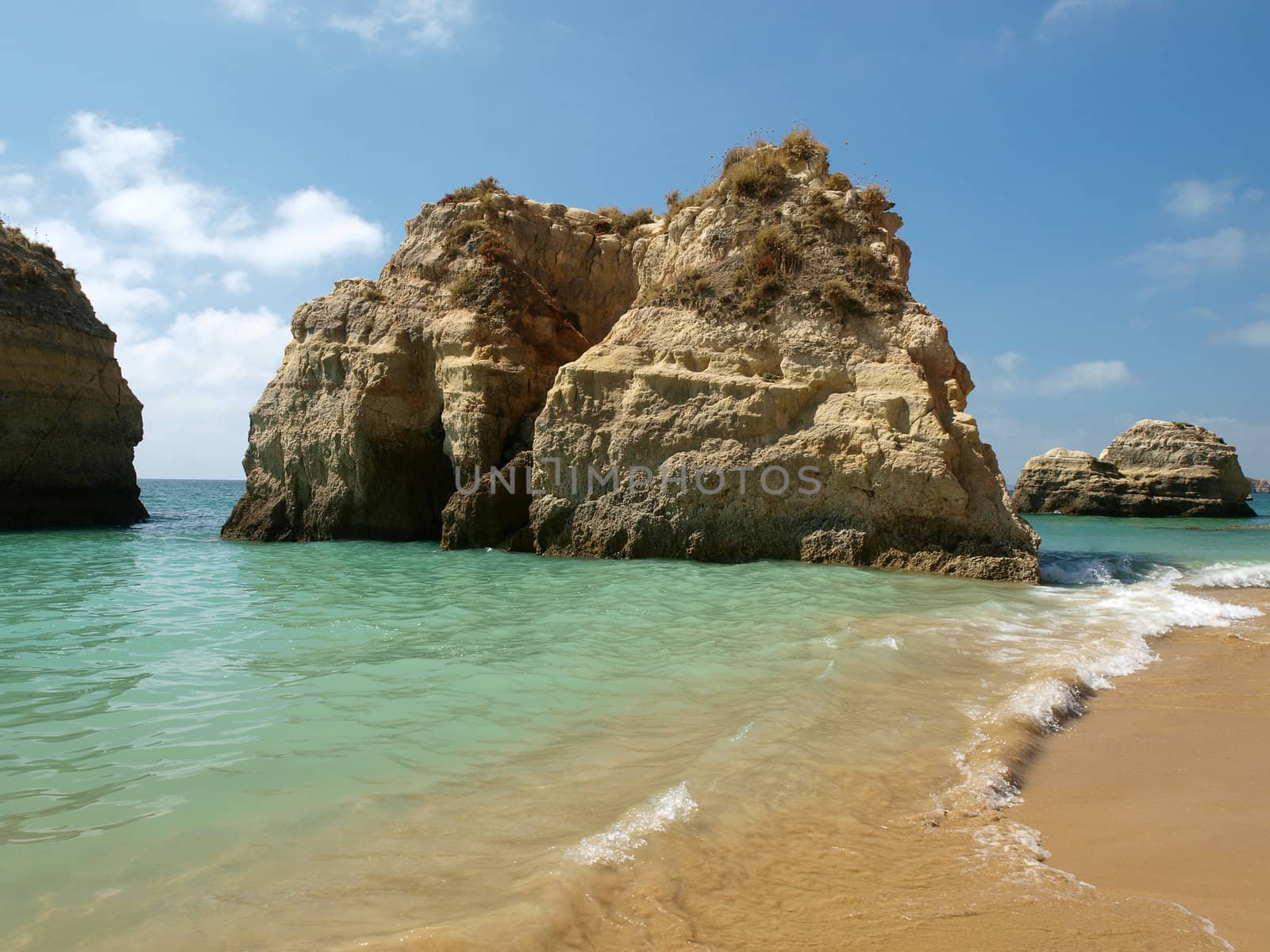 Caves and colourful rock formations on the Algarve coast in Portugal
