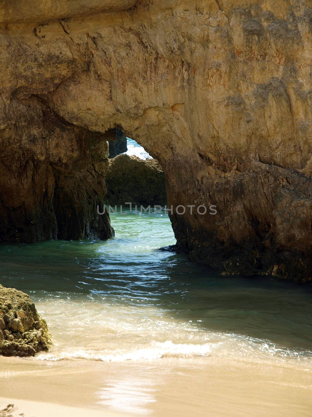 Caves and colourful rock formations on the Algarve coast in Portugal