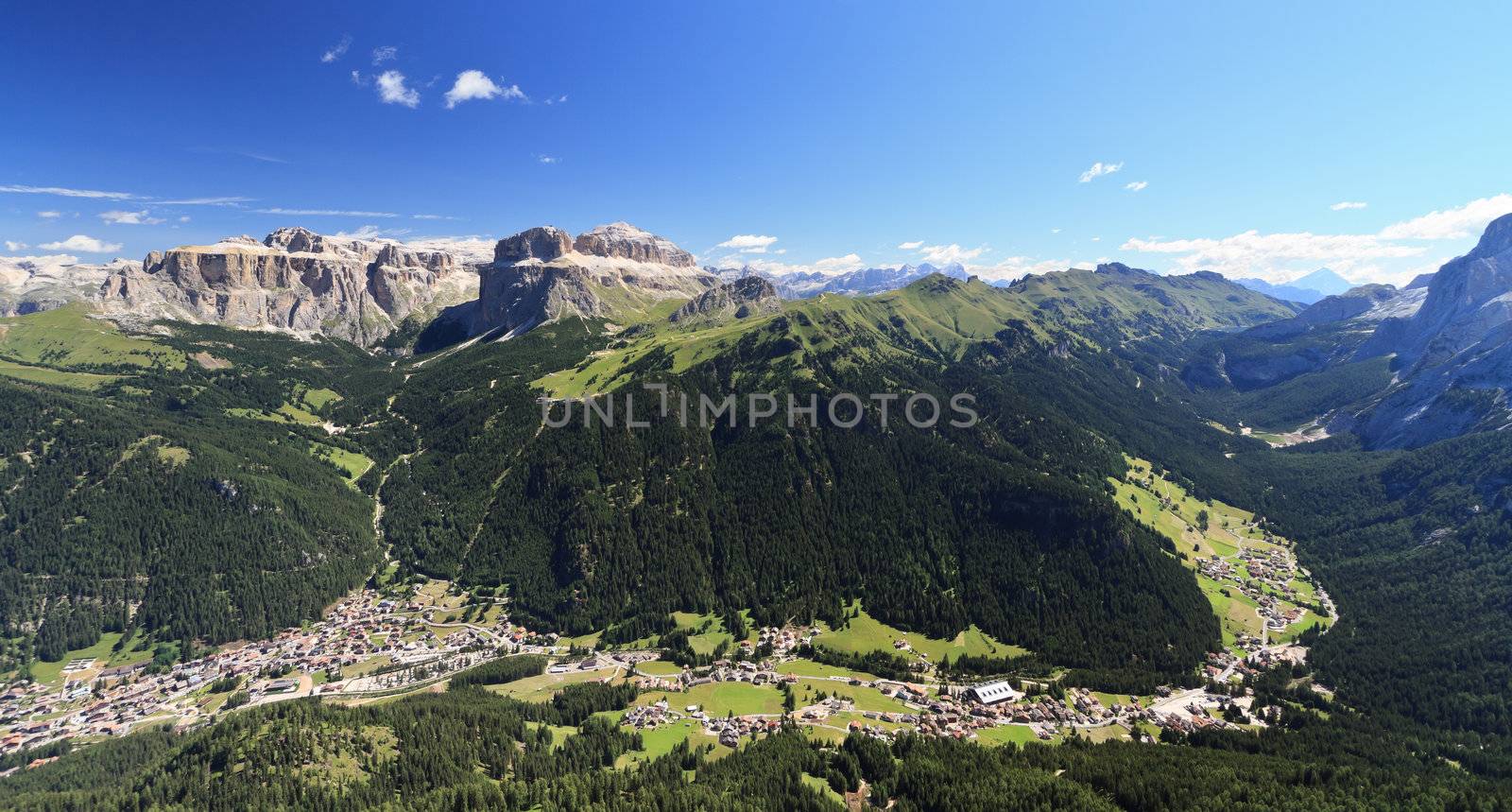 Panoramic view of Canazei and Fassa valley with Saas Pordoi mount, Fedaia and Pordoi pass 