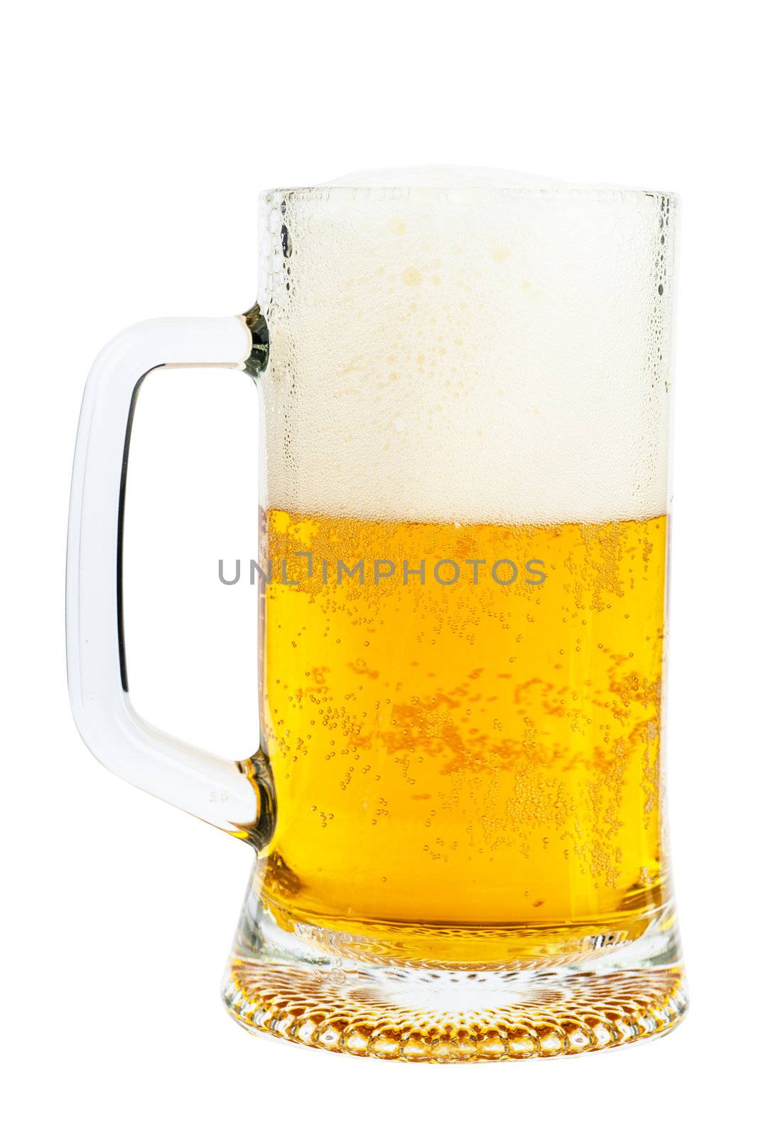 Orange beer and white froth in a glass isolated over white background
