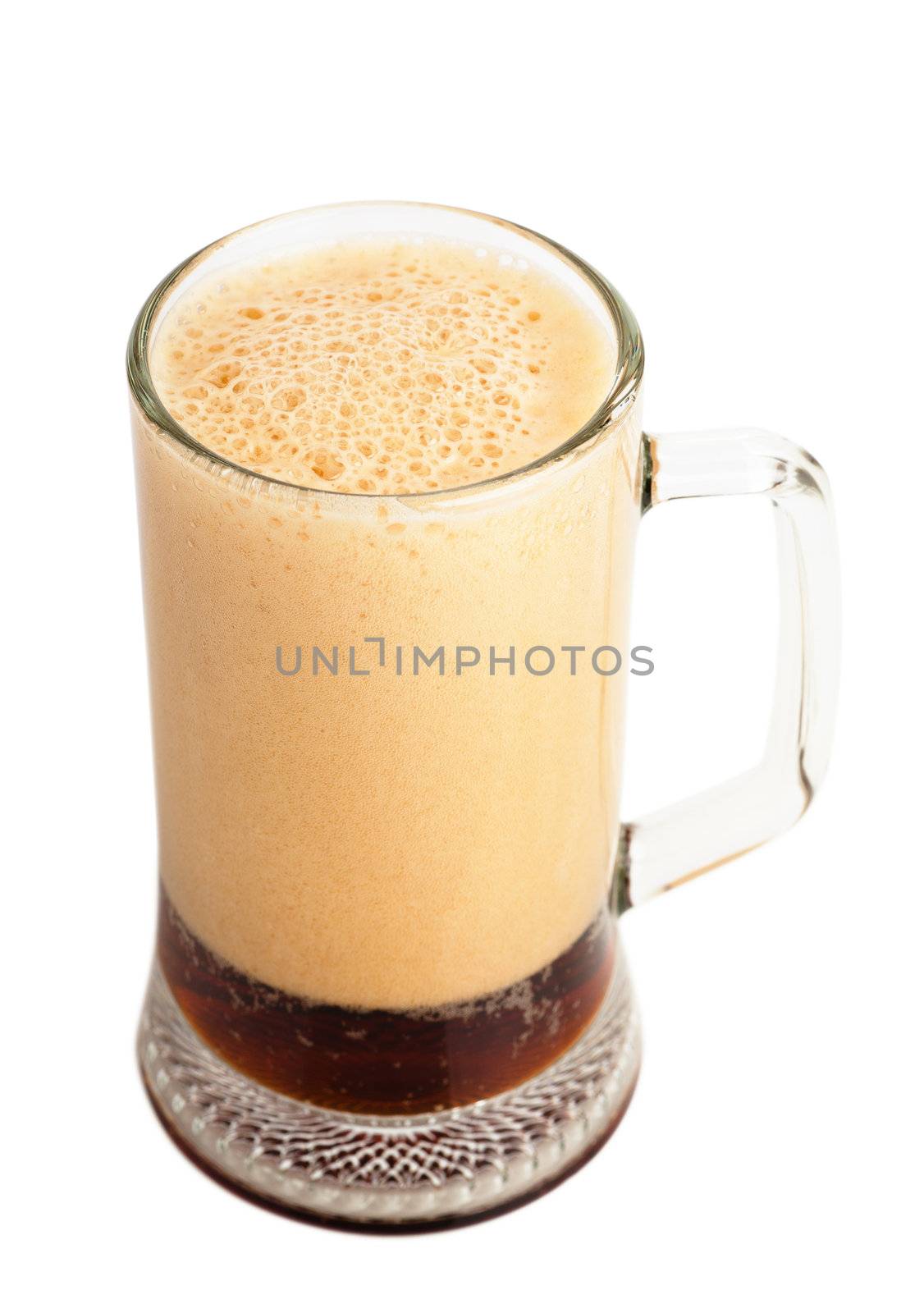 Brown ale in a glass over white background