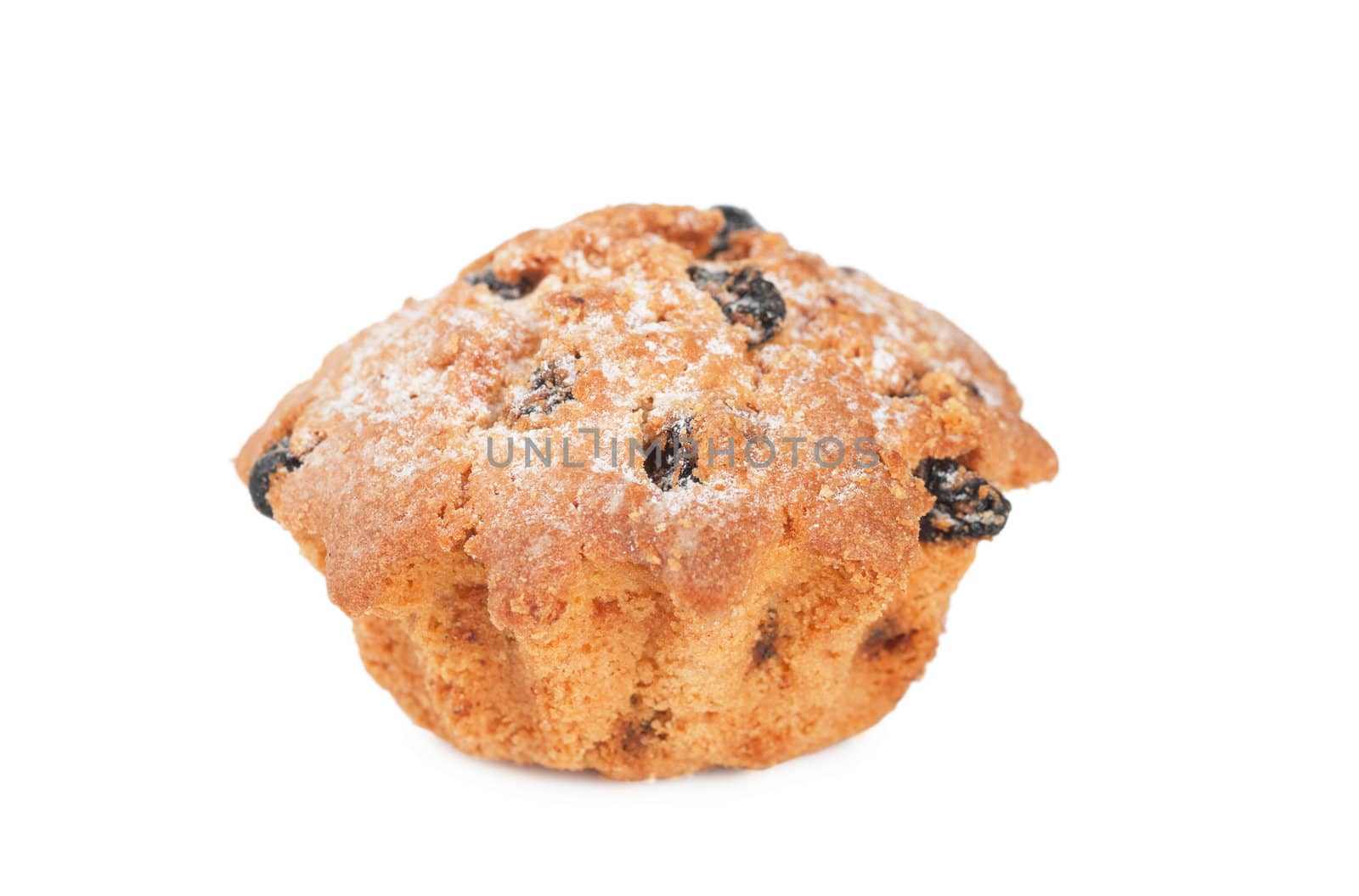 Closeup view of single cake with raisins over white background