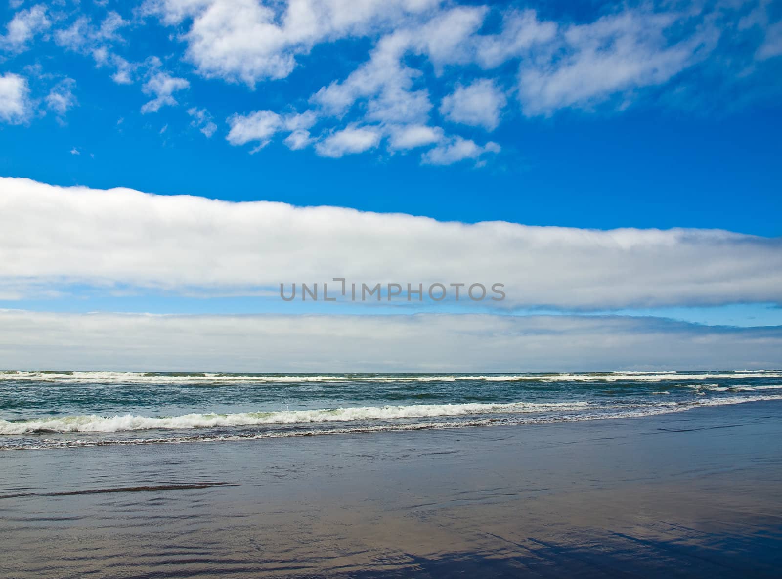 Coastline at the Beach on a Partly Cloudy and Sunny Day