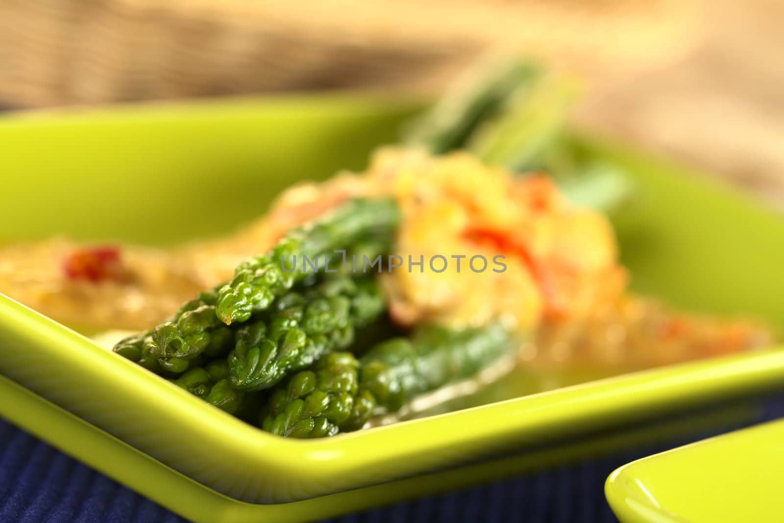 Green asparagus curry (Selective Focus, Focus on the three upper asparagus tips)