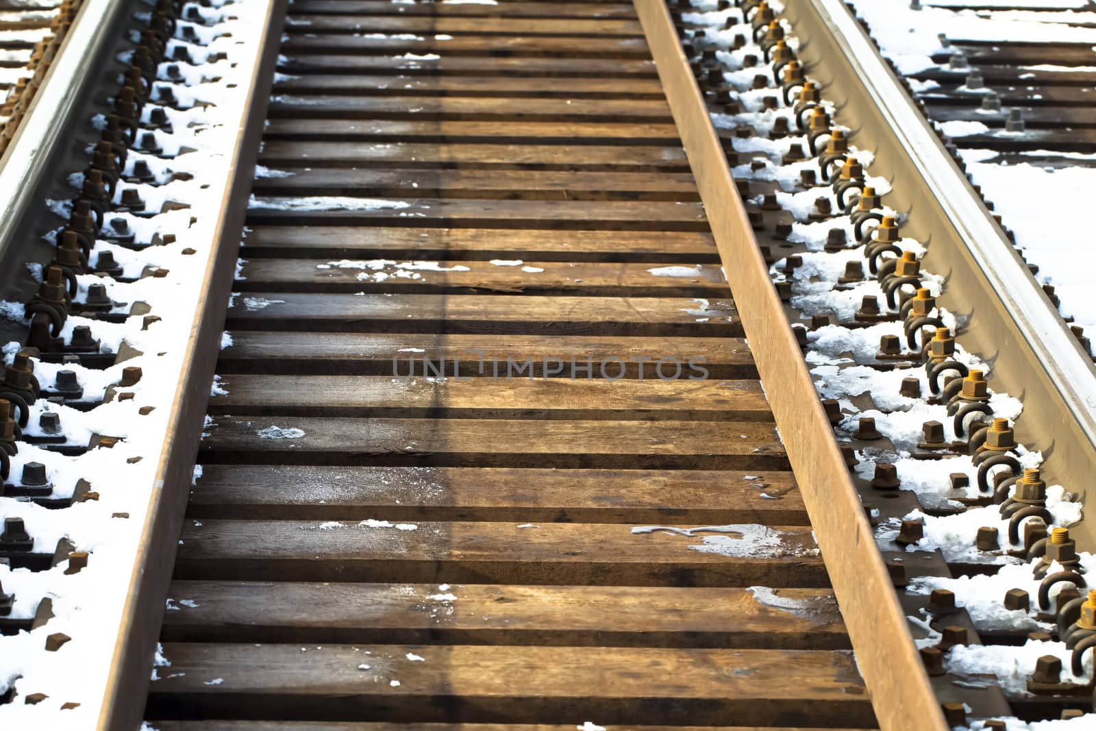 Railroad in light brown color in winter