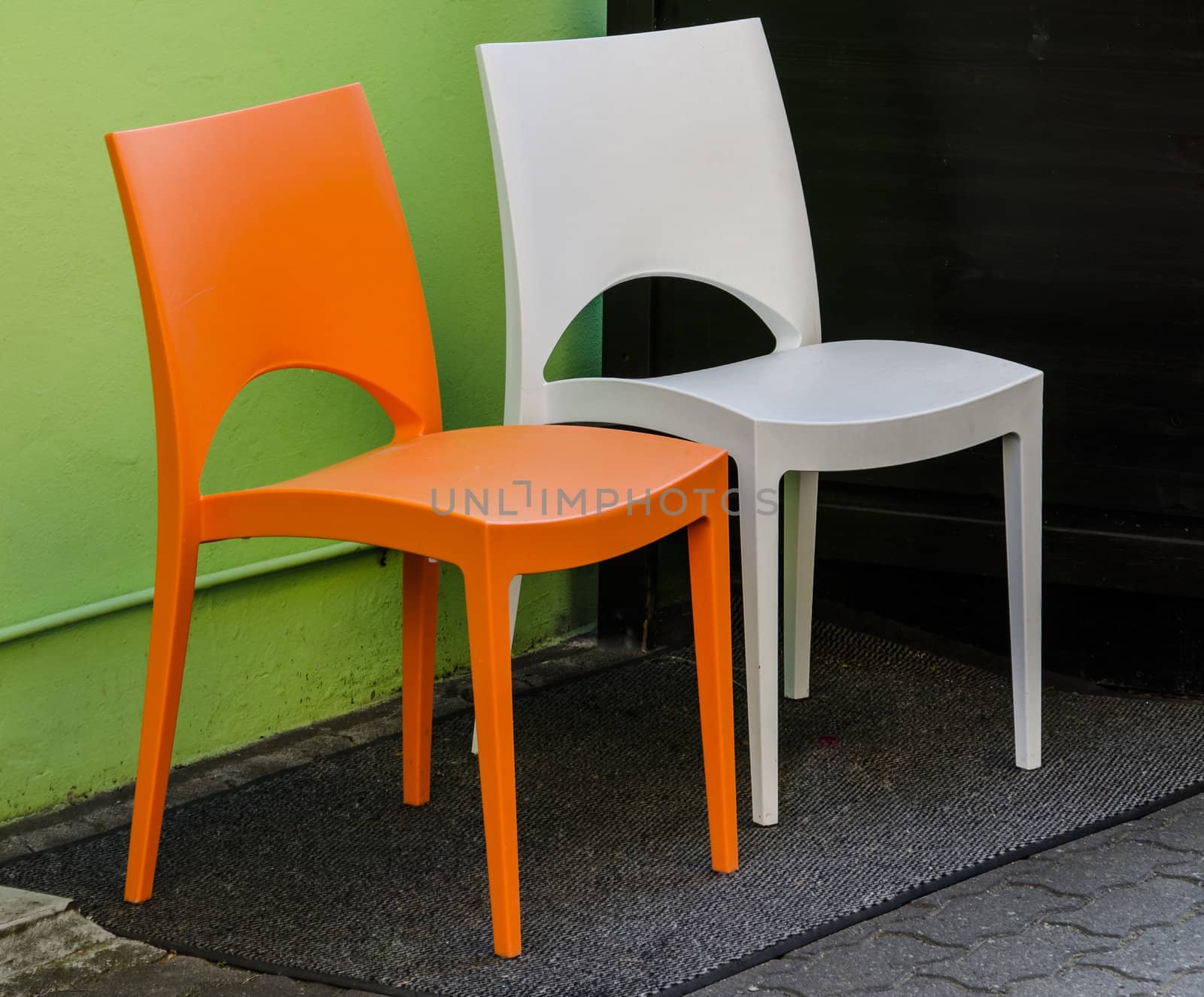 Pair of plastic chairs