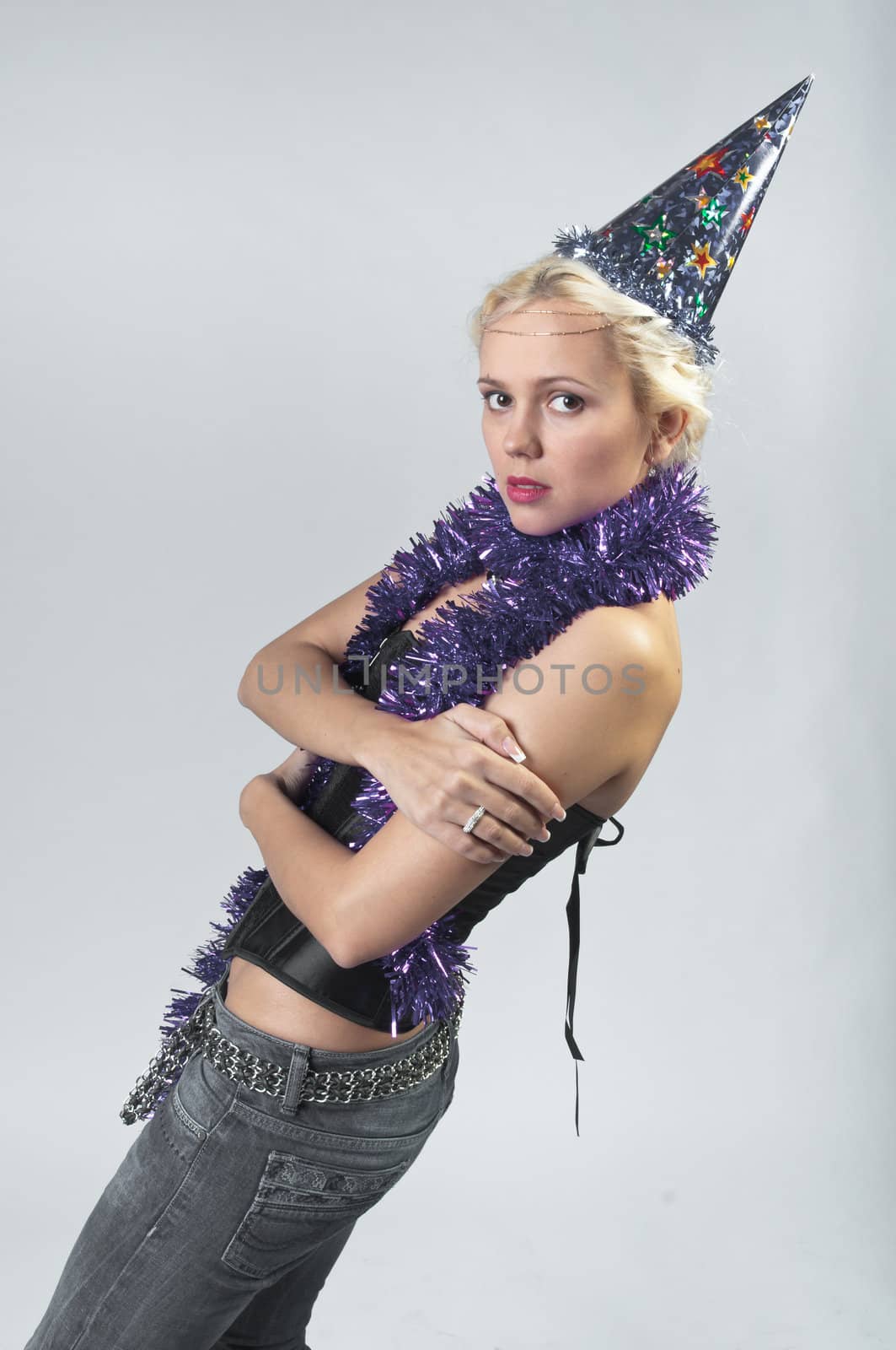 Young and beautiful girl with gifts waiting for the Christmas and New Year