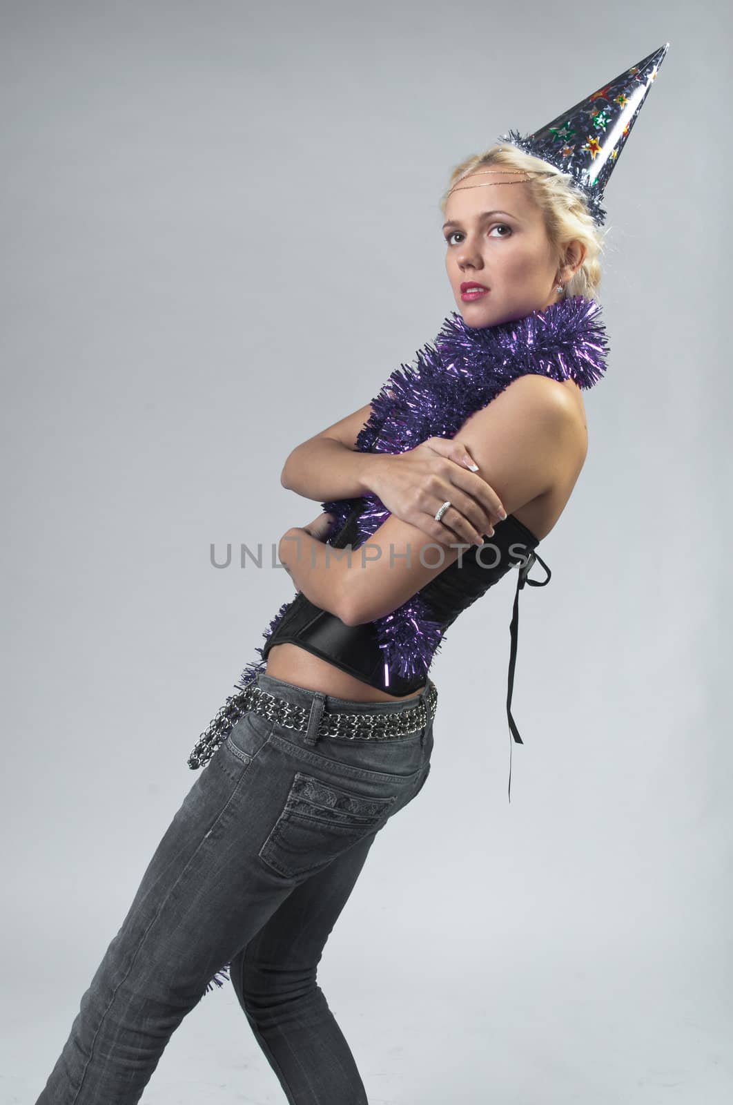 Young and beautiful girl with gifts waiting for the Christmas and New Year