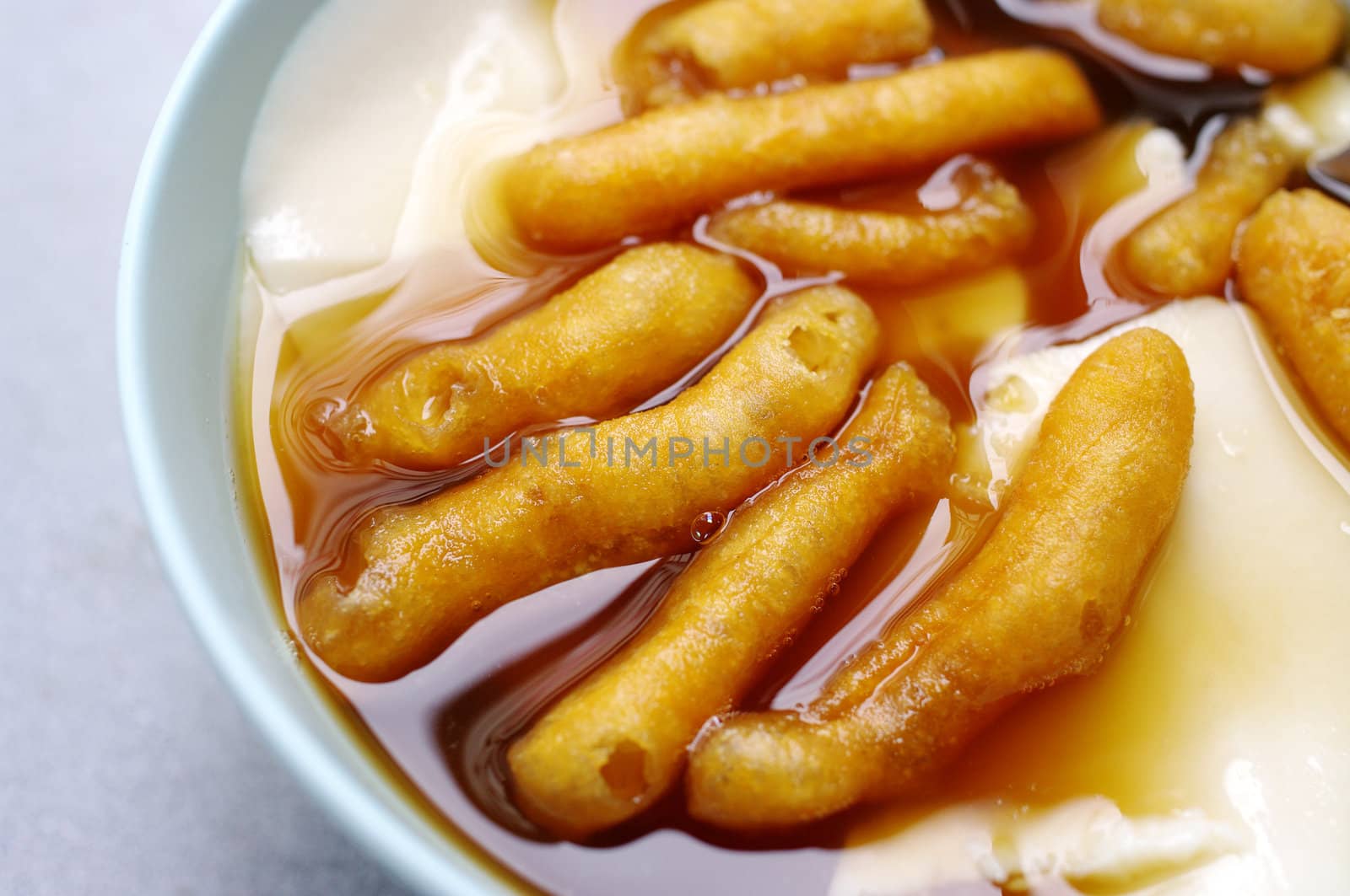 Tofu Pudding Dessert, Bean junket eaten hot with gingered sirup and mini deep-fried dough stick