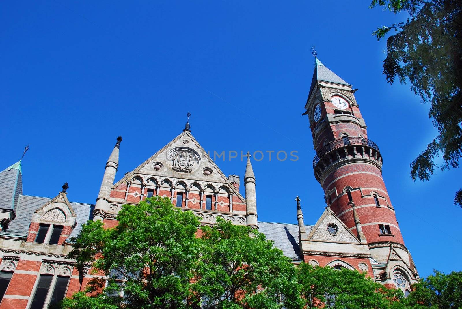 top of brick church in New York City over blue sky