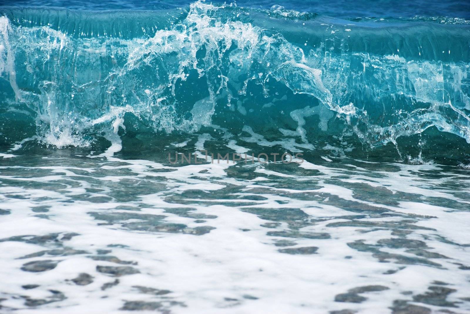 blue wave formation with foam in adriatic sea