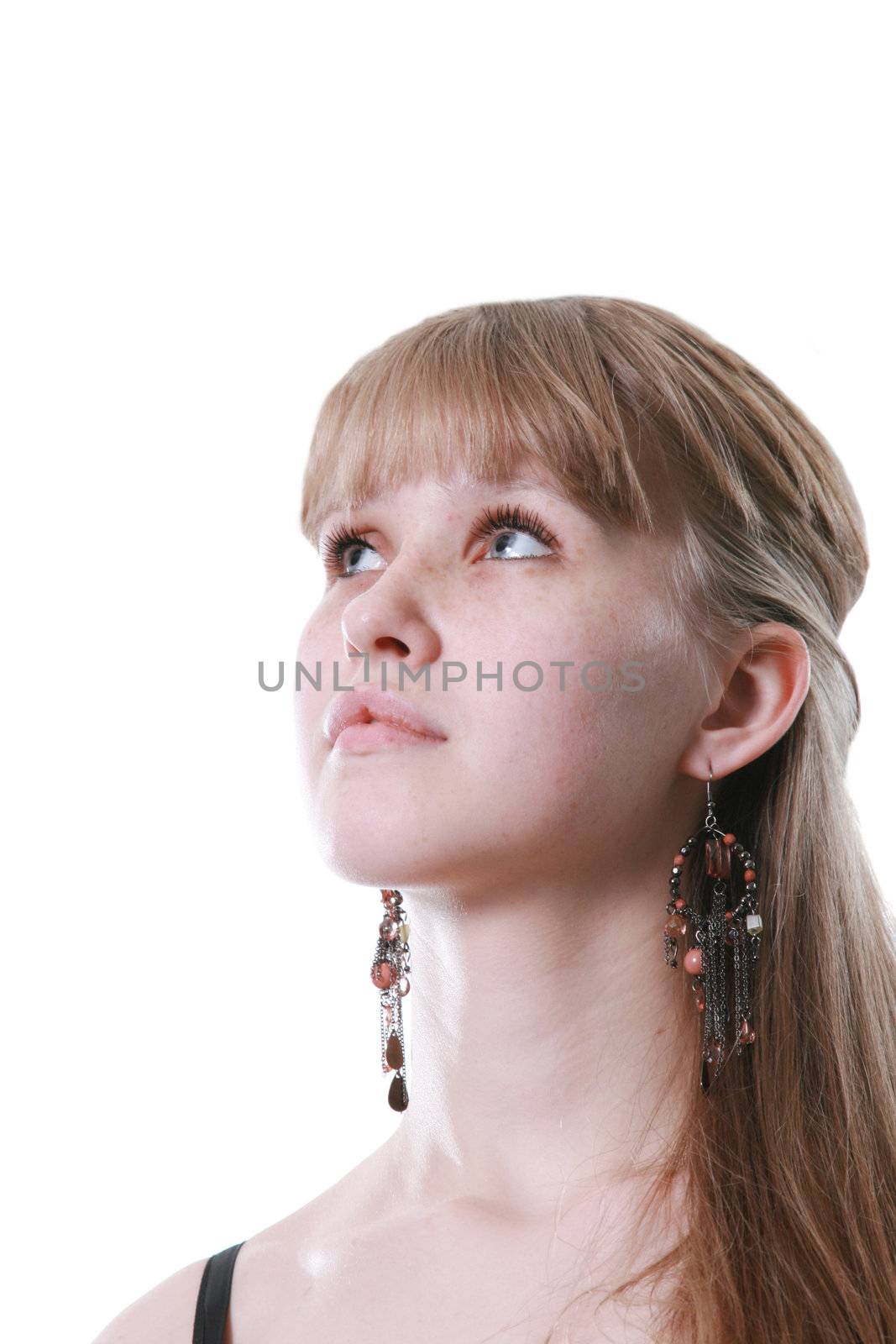 Portrait of the young beautiful woman on a white background