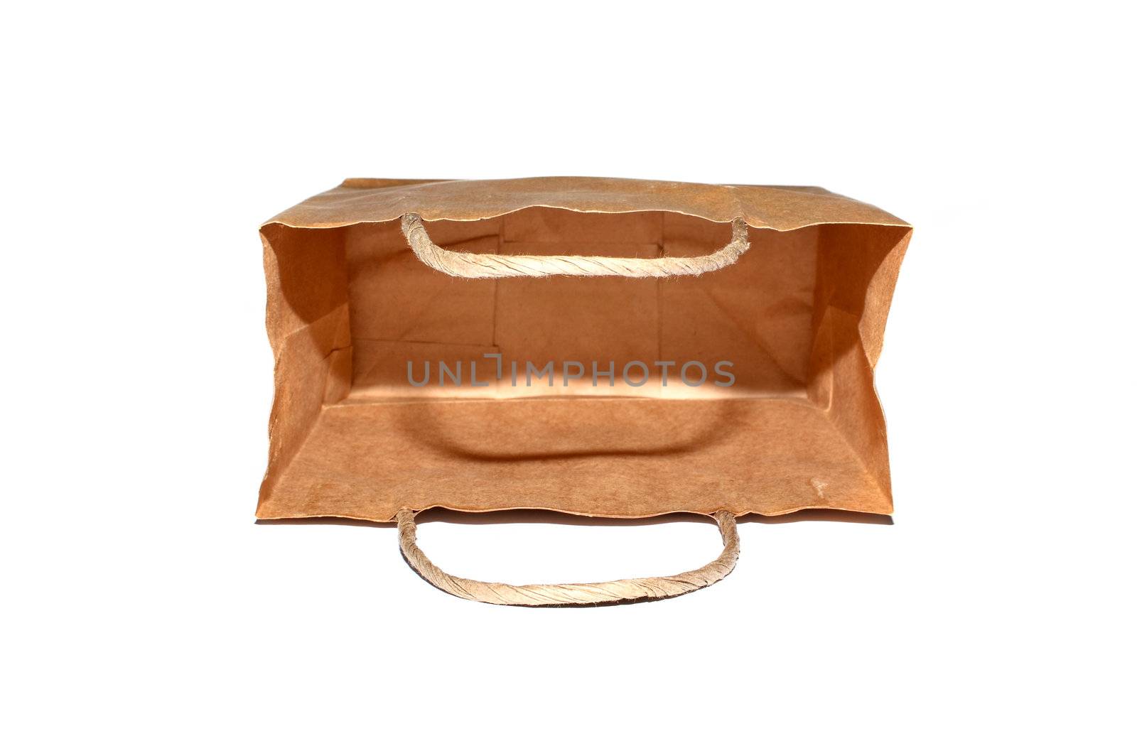 blank brown paper bag isolated on white background