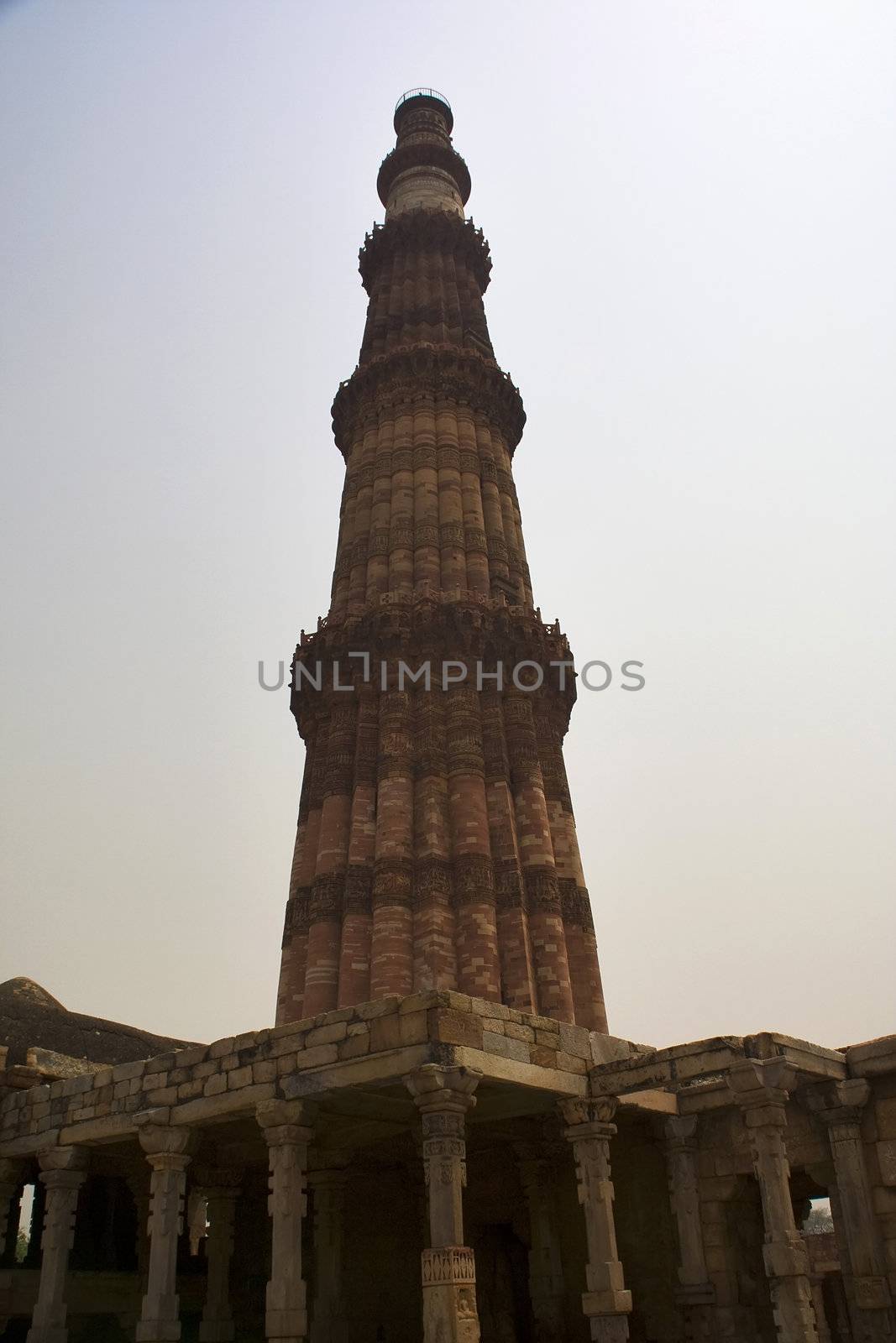 Qutab Minar with Mosque at Base, Delhi, India