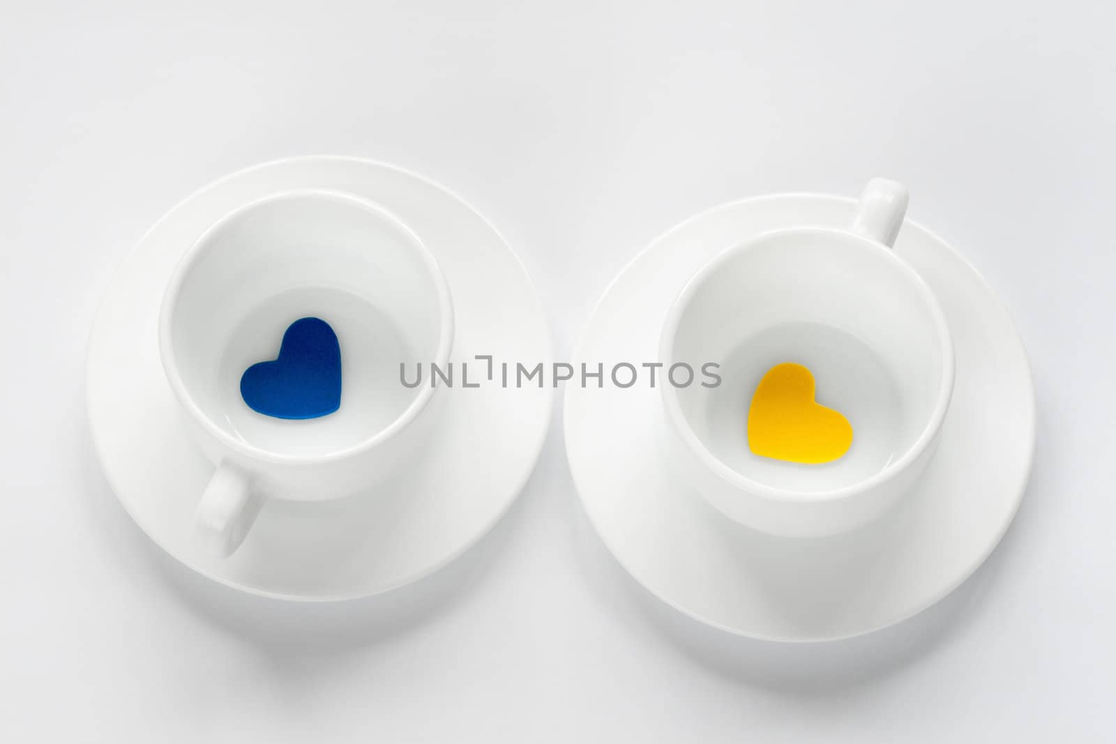 empty cup and saucer with hearts by sfinks