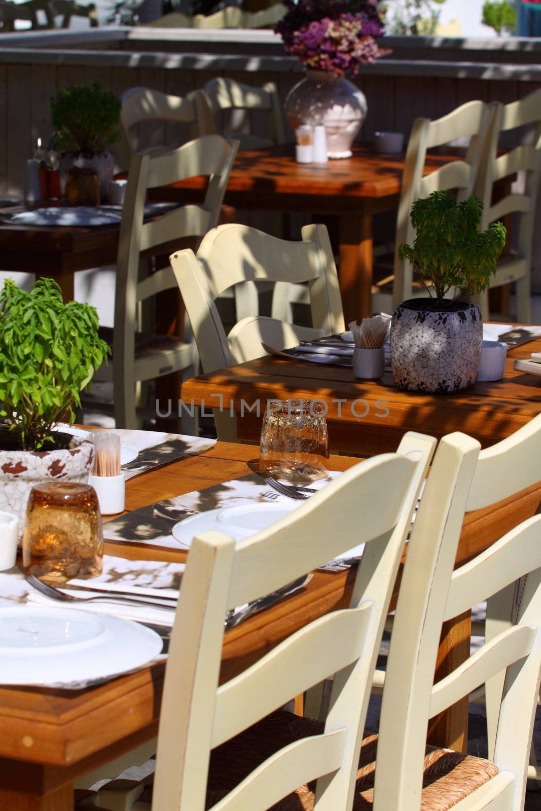 Cafe setting in the greek islands by mariusz_prusaczyk