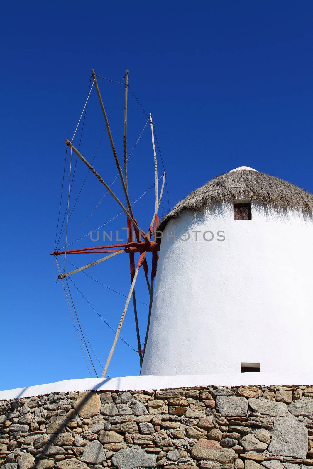 Windmills of sunny Mykonos (Greece, Cyclades)  by mariusz_prusaczyk