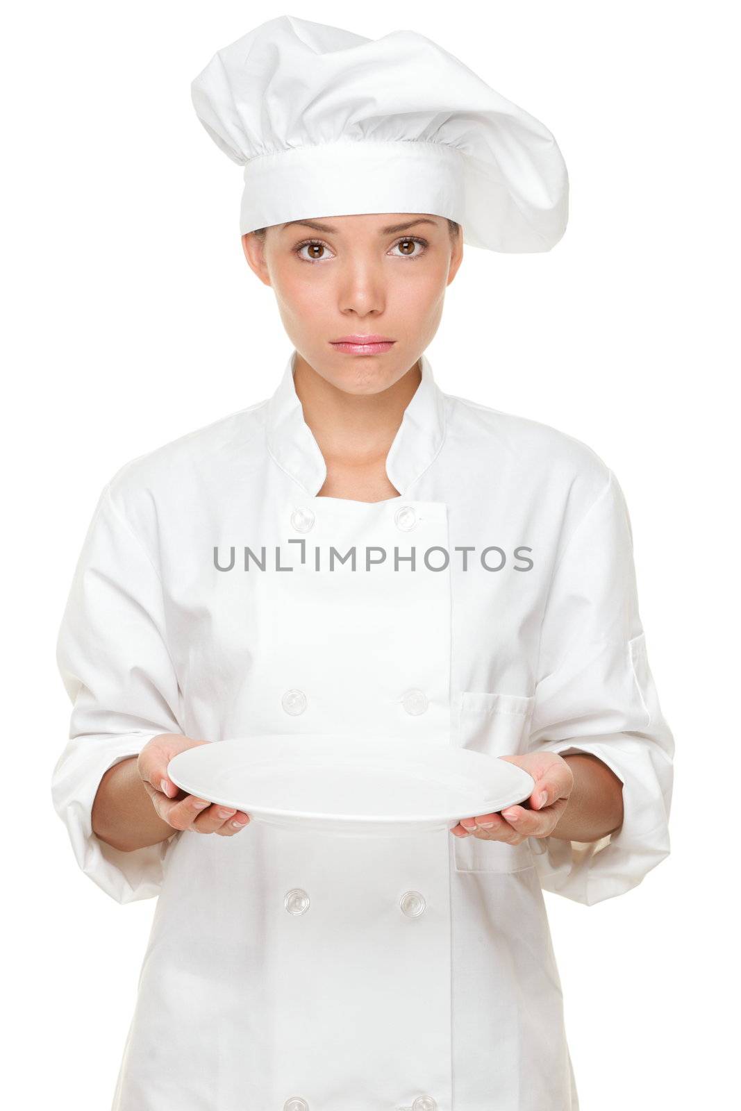 Chef disappointed and sad with empty plate. Woman chef serving empty plate looking negative and funny. Multicultural Asian Caucasian woman chef.
