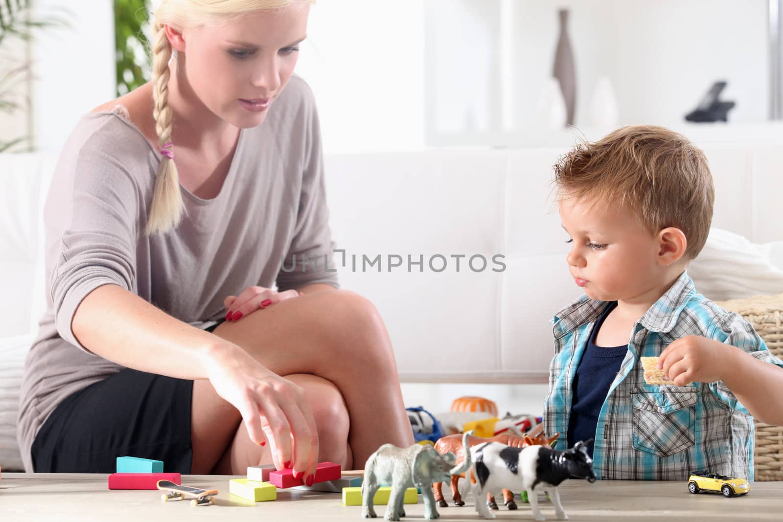 Mom and son playing by phovoir