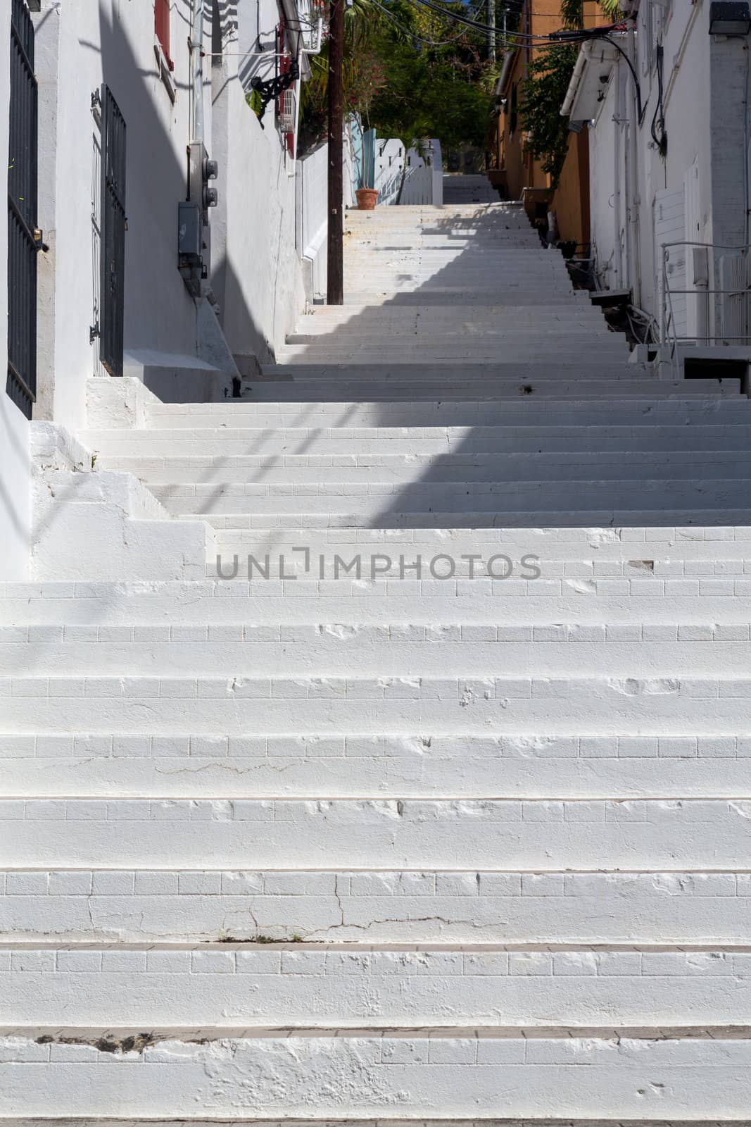 Series of white painted steps in staircase by side of Government house in Charlotte Amalie St Thomas