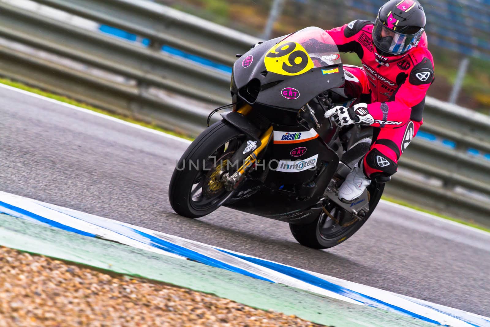 JEREZ DE LA FRONTERA, SPAIN - NOV 19: Moto2 motorcyclist Lucas Mahias takes a curve in the CEV Championship race on November 19, 2011 in Jerez de la Frontera, Spain.