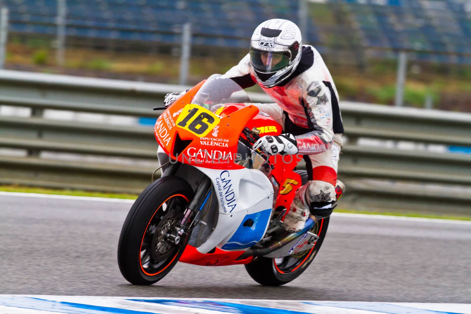 JEREZ DE LA FRONTERA, SPAIN - NOV 19: Moto2 motorcyclist Oscar Climent takes a curve in the CEV Championship race on November 19, 2011 in Jerez de la Frontera, Spain.