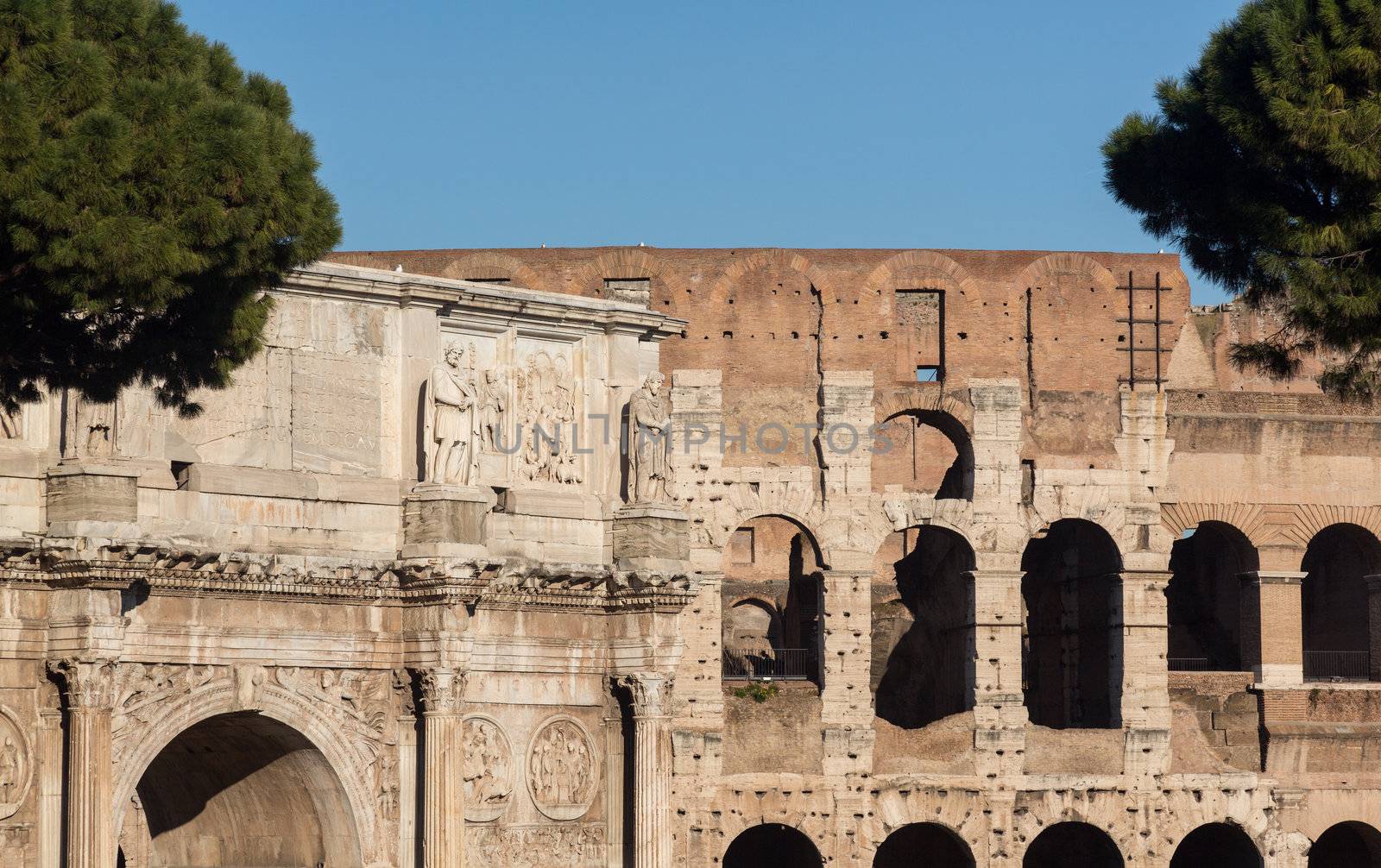 Detail of arch of Constantine and Colosseum in Ancient Rome