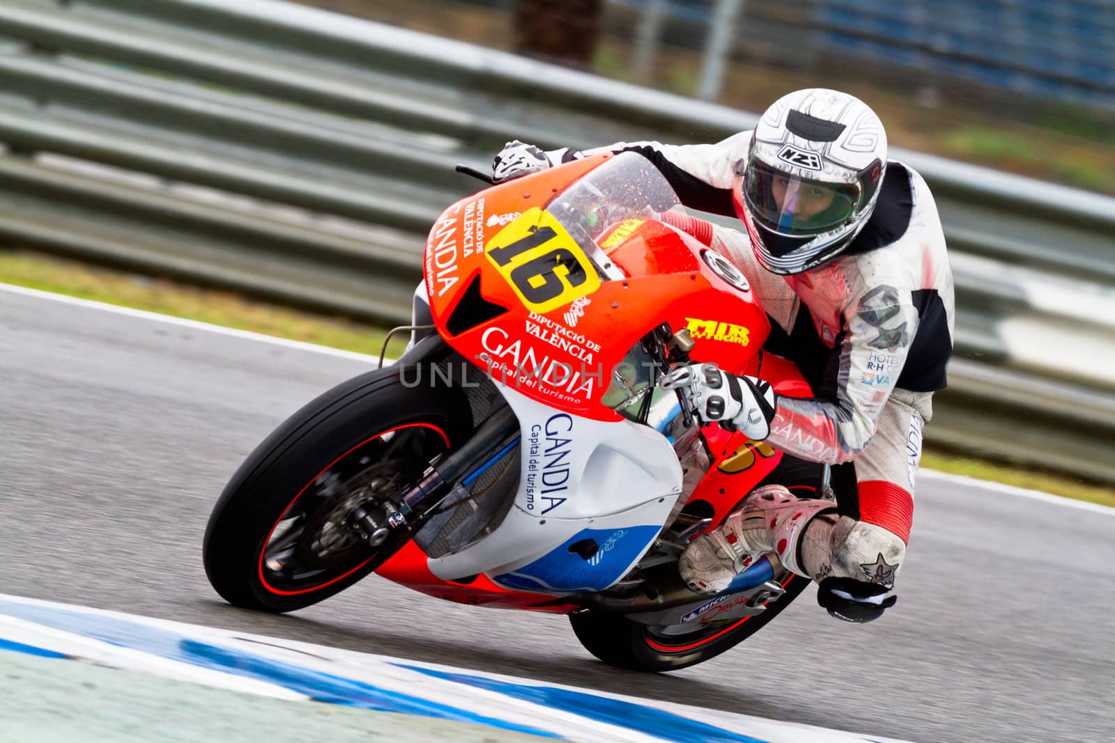 JEREZ DE LA FRONTERA, SPAIN - NOV 19: Moto2 motorcyclist Oscar Climent takes a curve in the CEV Championship race on November 19, 2011 in Jerez de la Frontera, Spain.