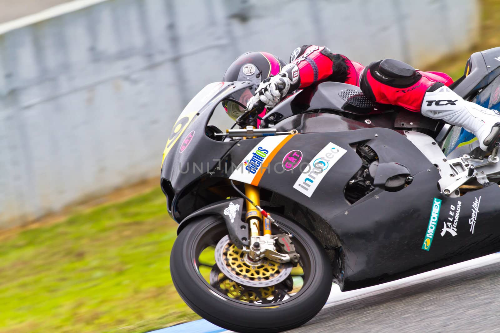 JEREZ DE LA FRONTERA, SPAIN - NOV 19: Moto2 motorcyclist Lucas Mahias takes a curve in the CEV Championship race on November 19, 2011 in Jerez de la Frontera, Spain.