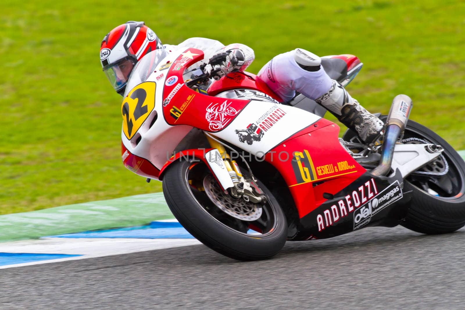 JEREZ DE LA FRONTERA, SPAIN - NOV 19: Moto2 motorcyclist Alessandro Andreozzi takes a curve in the CEV Championship race on November 19, 2011 in Jerez de la Frontera, Spain.