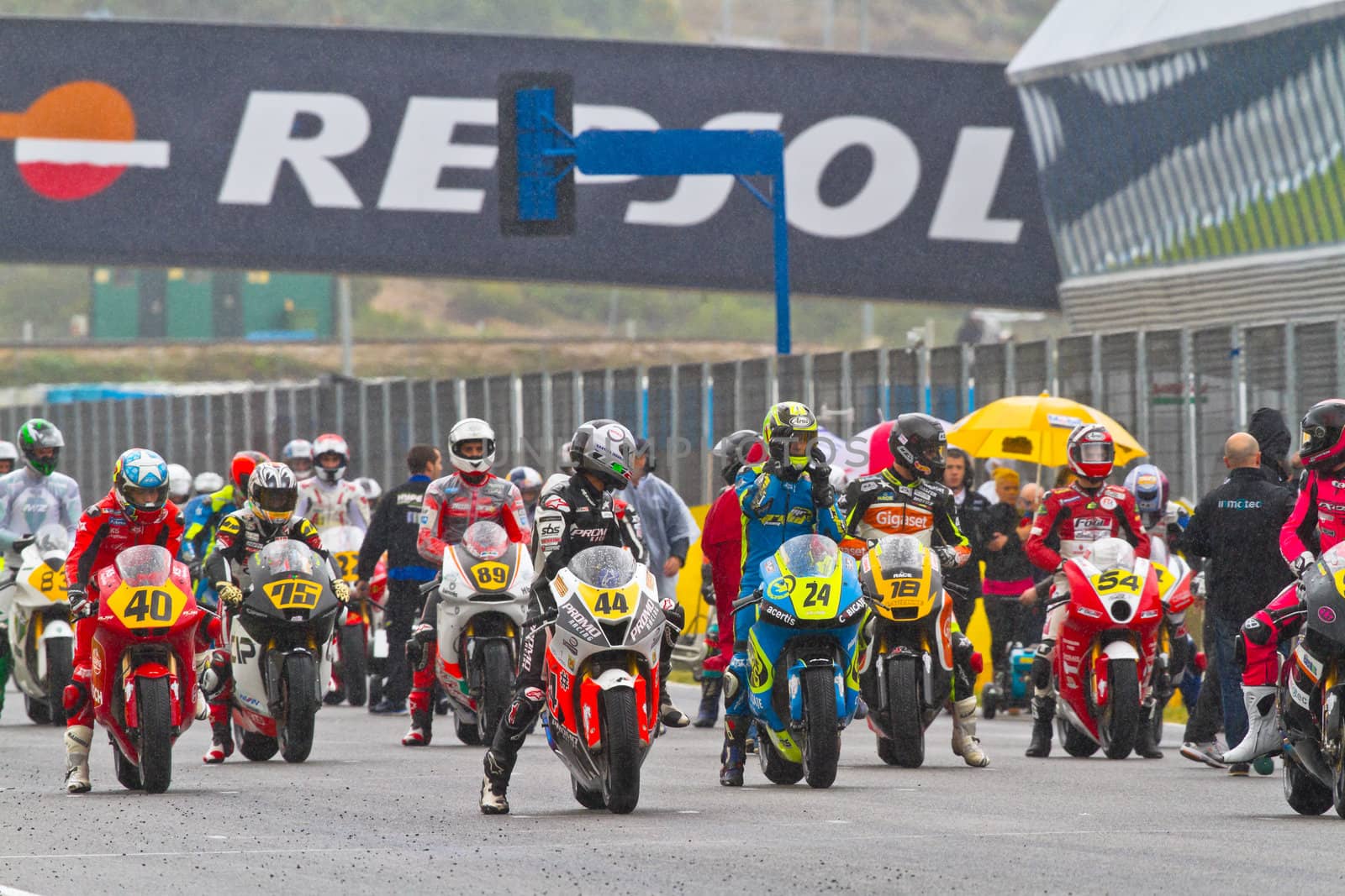 JEREZ DE LA FRONTERA, SPAIN - NOV 20: Motorbike competitors begin the Moto2 race in the CEV Championship on November 20, 2011 in Jerez de la Frontera, Spain.