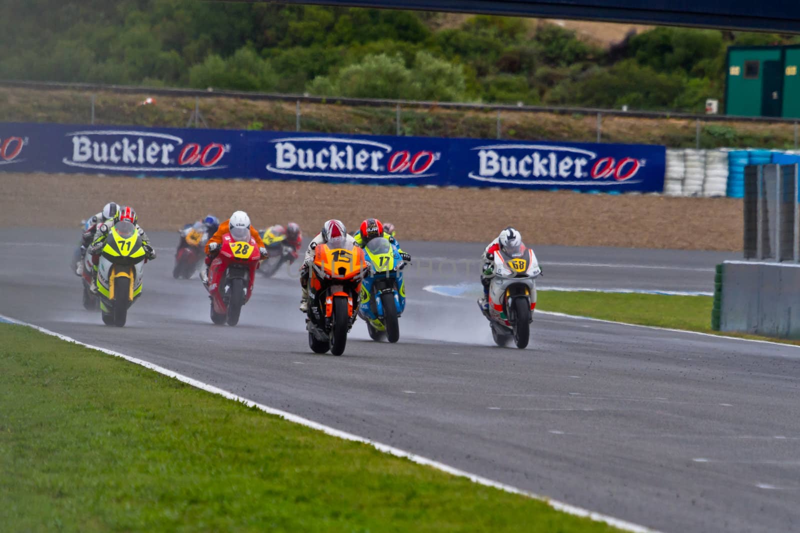 JEREZ DE LA FRONTERA, SPAIN - NOV 20: Motorbike competitors begin the Moto2 race in the CEV Championship on November 20, 2011 in Jerez de la Frontera, Spain.