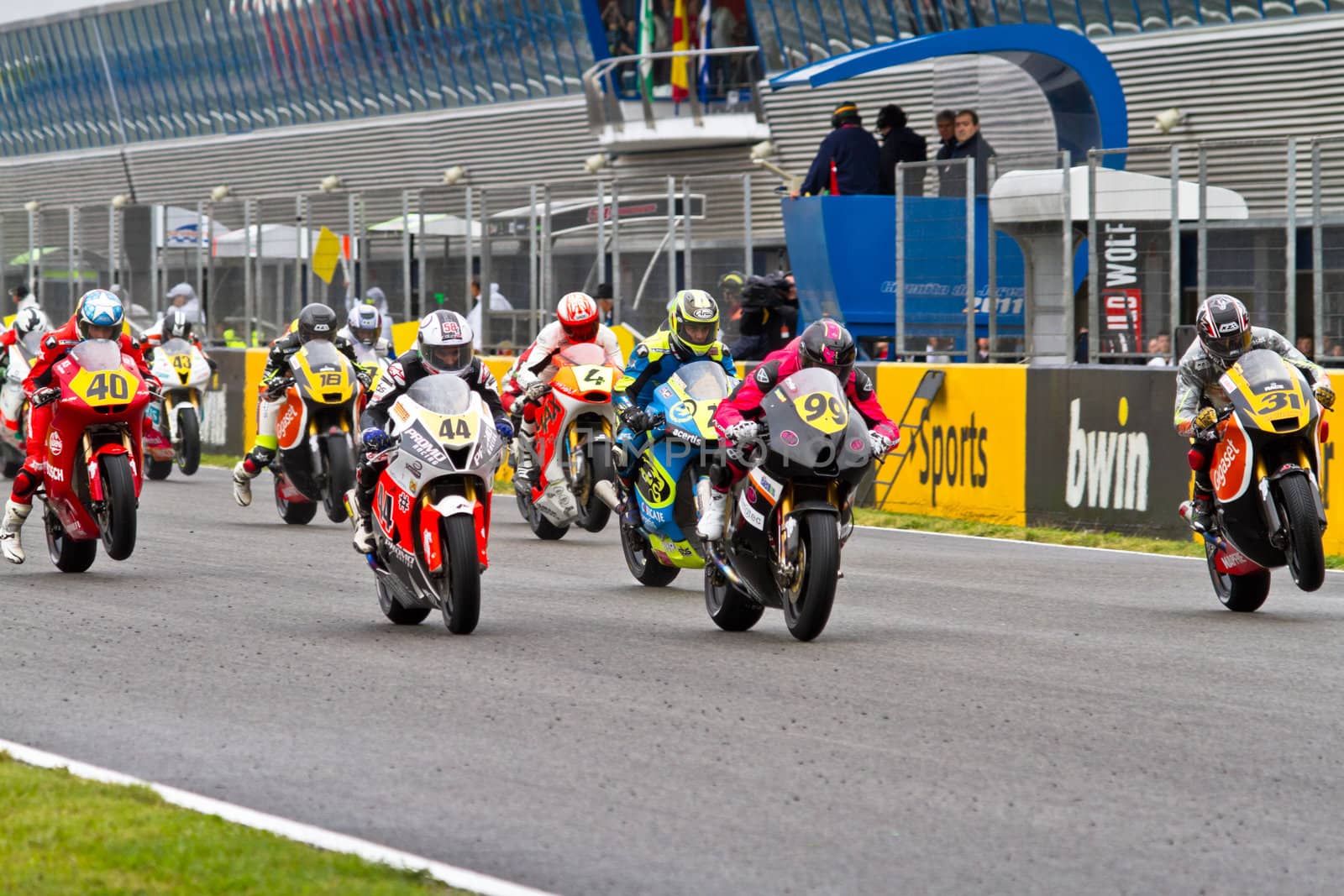 JEREZ DE LA FRONTERA, SPAIN - NOV 20: Motorbike competitors begin the Moto2 race in the CEV Championship on November 20, 2011 in Jerez de la Frontera, Spain.