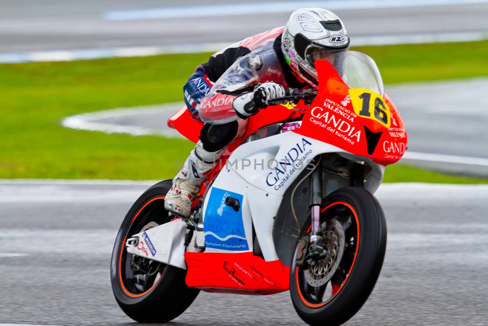 JEREZ DE LA FRONTERA, SPAIN - NOV 20: Moto2 motorcyclist Oscar Climent races in the CEV Championship race on November 20, 2011 in Jerez de la Frontera, Spain.