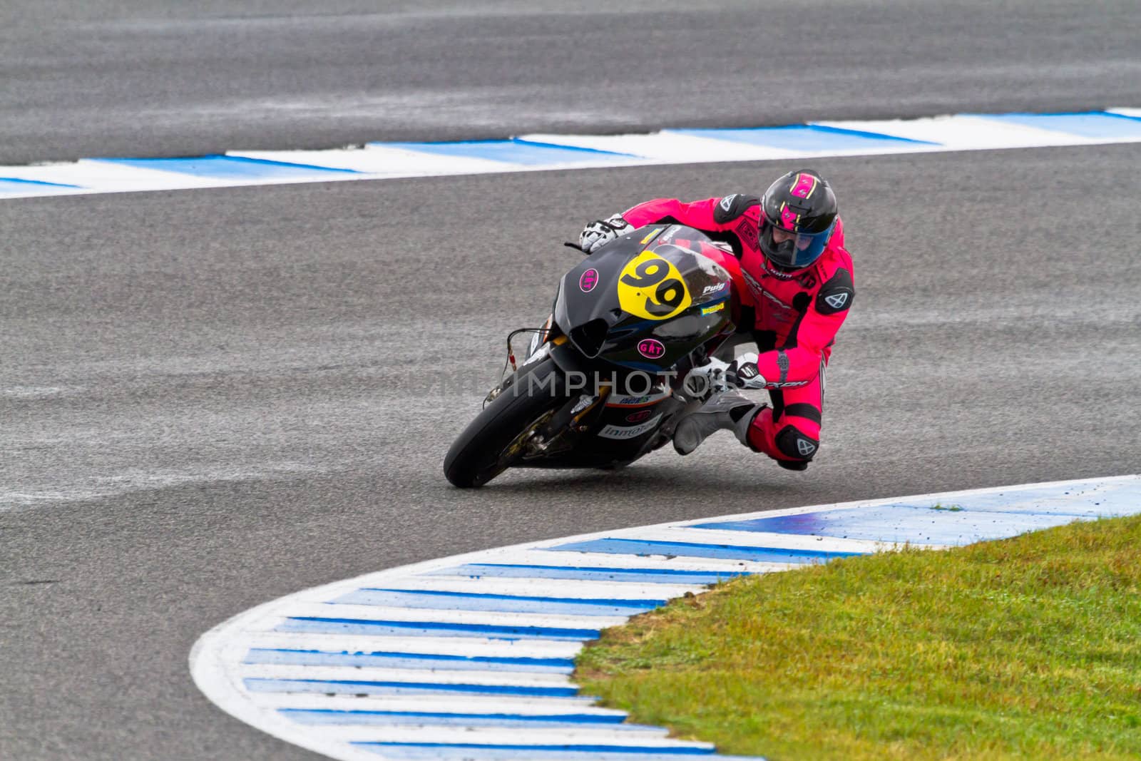 JEREZ DE LA FRONTERA, SPAIN - NOV 20: Moto2 motorcyclist Lucas Mahias takes a curve in the CEV Championship race on November 20, 2011 in Jerez de la Frontera, Spain.