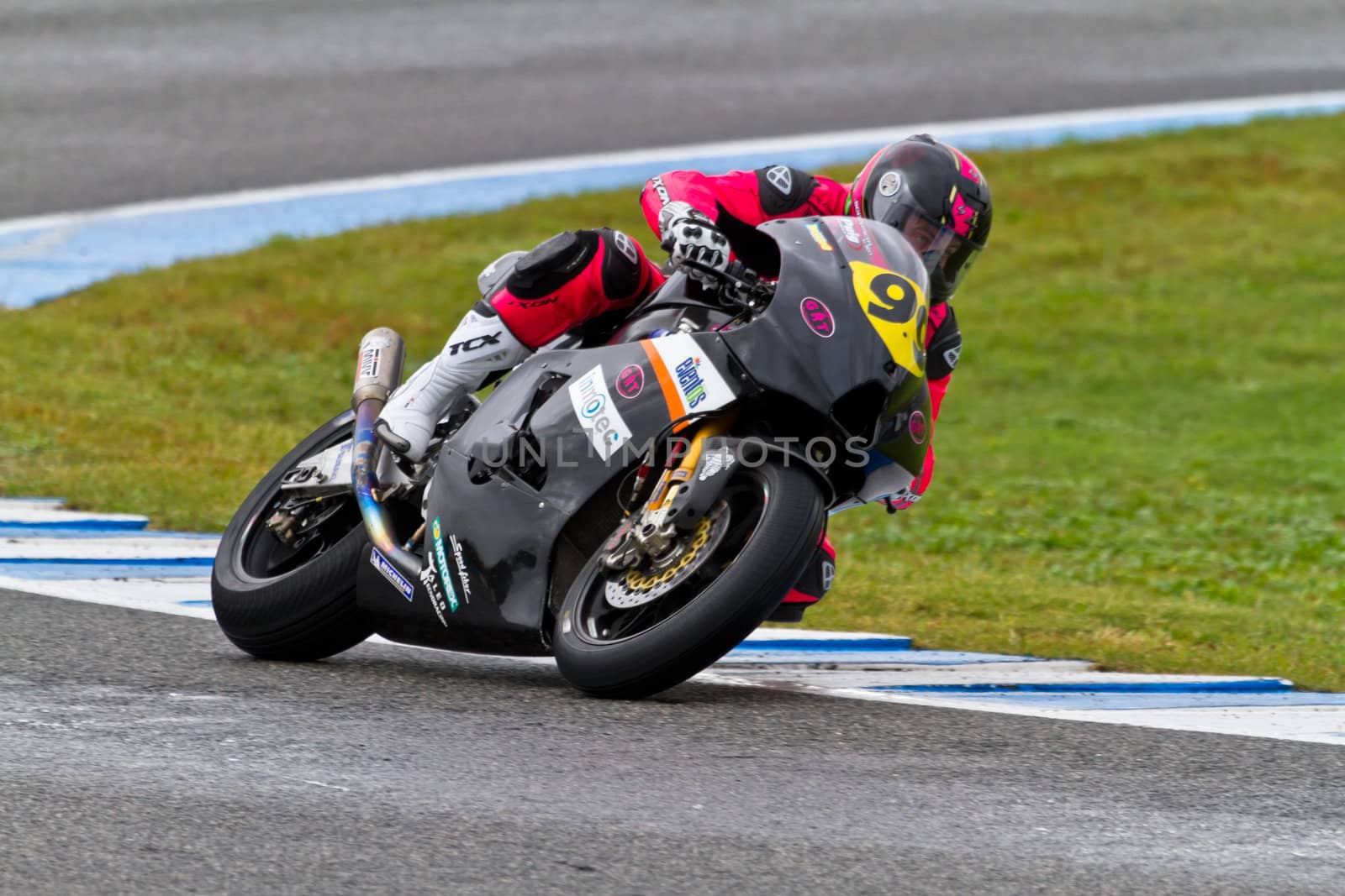 JEREZ DE LA FRONTERA, SPAIN - NOV 20: Moto2 motorcyclist Lucas Mahias takes a curve in the CEV Championship race on November 20, 2011 in Jerez de la Frontera, Spain.