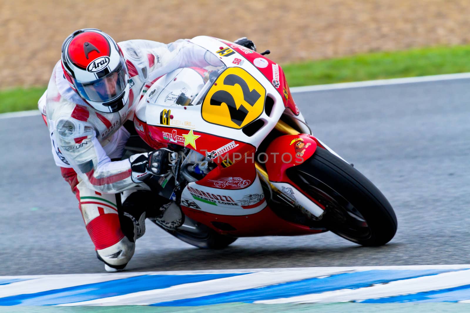 JEREZ DE LA FRONTERA, SPAIN - NOV 20: Moto2 motorcyclist Alessandro Andreozzi takes a curve in the CEV Championship race on November 20, 2011 in Jerez de la Frontera, Spain.