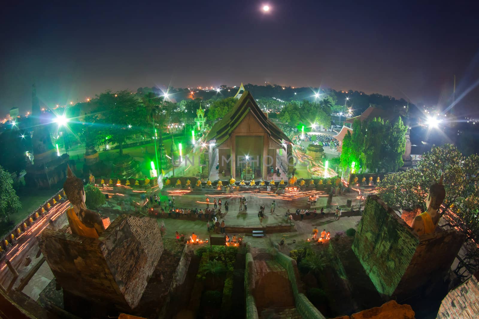 Religion Crowd walking with Candle Light around Temple in Makabucha day at Wat Yai Chaimongkol in Ayutthaya, Thailand